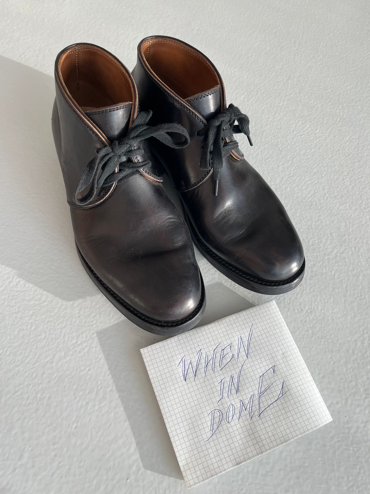 Photo by Sips on November 5, 2024 of the Flame Panda Chukkas in Maryam Natural Horsebutt Overdyed Brown then Black.