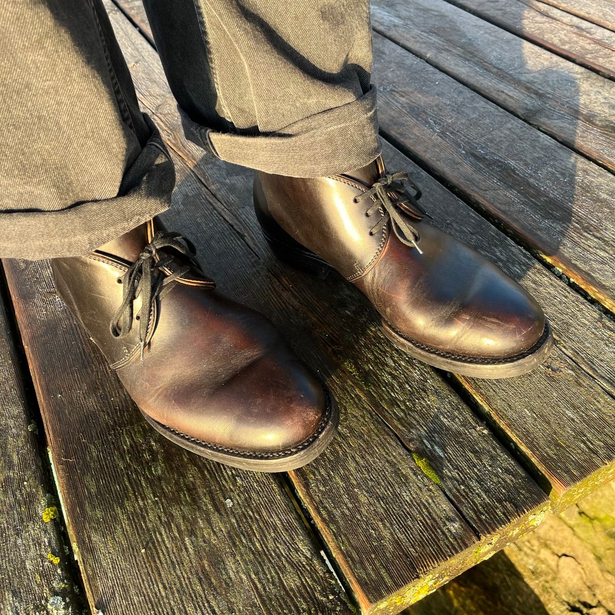 Photo by Sips on December 5, 2024 of the Flame Panda Chukkas in Maryam Natural Horsebutt Overdyed Brown then Black.