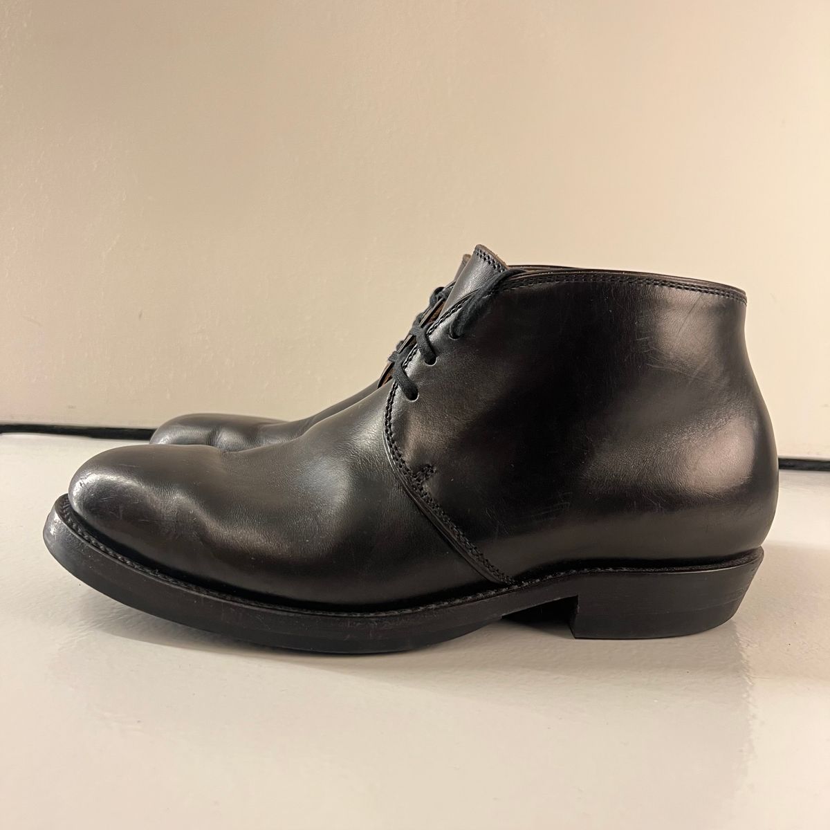 Photo by Sips on December 5, 2024 of the Flame Panda Chukkas in Maryam Natural Horsebutt Overdyed Brown then Black.