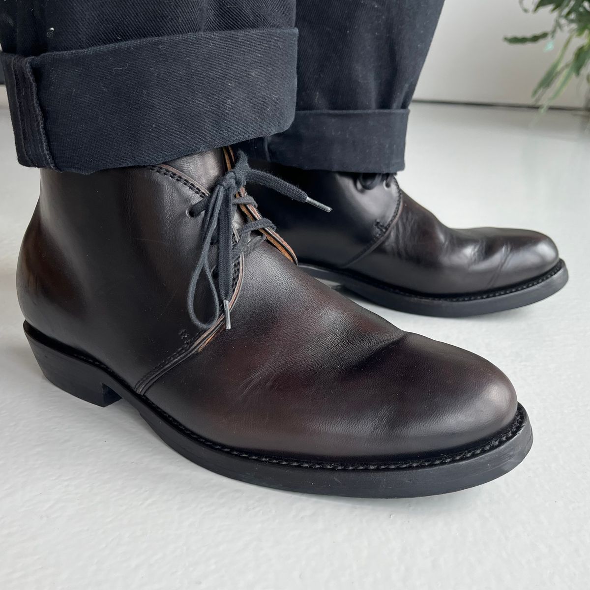 Photo by Sips on December 24, 2024 of the Flame Panda Chukkas in Maryam Natural Horsebutt Overdyed Brown then Black.