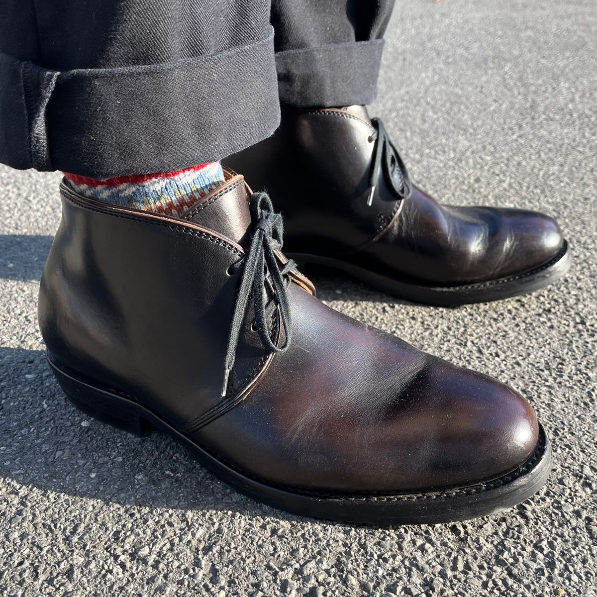 Photo by Sips on December 29, 2024 of the Flame Panda Chukkas in Maryam Natural Horsebutt Overdyed Brown then Black.