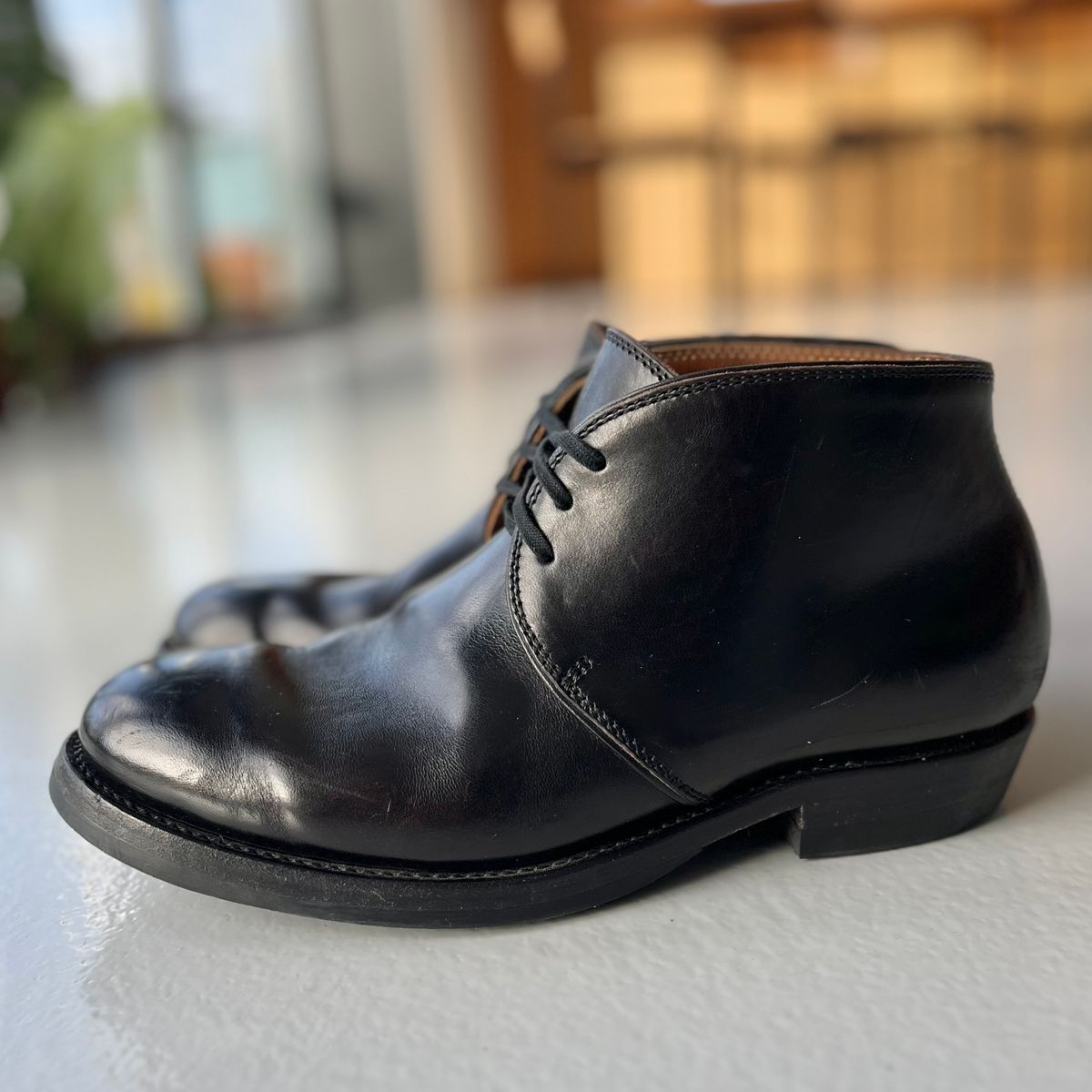 Photo by Sips on January 5, 2025 of the Flame Panda Chukkas in Maryam Natural Horsebutt Overdyed Brown then Black.