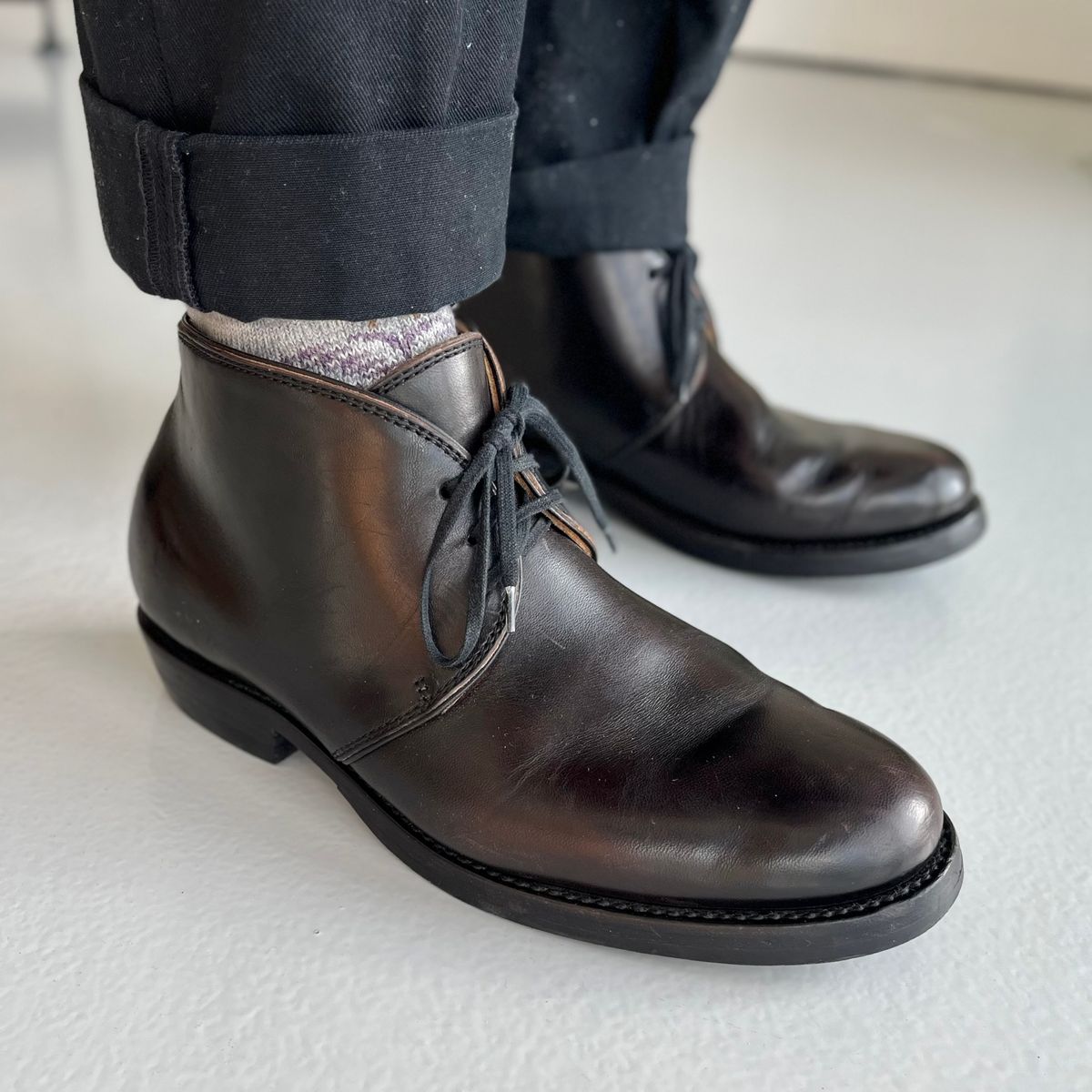 Photo by Sips on January 5, 2025 of the Flame Panda Chukkas in Maryam Natural Horsebutt Overdyed Brown then Black.