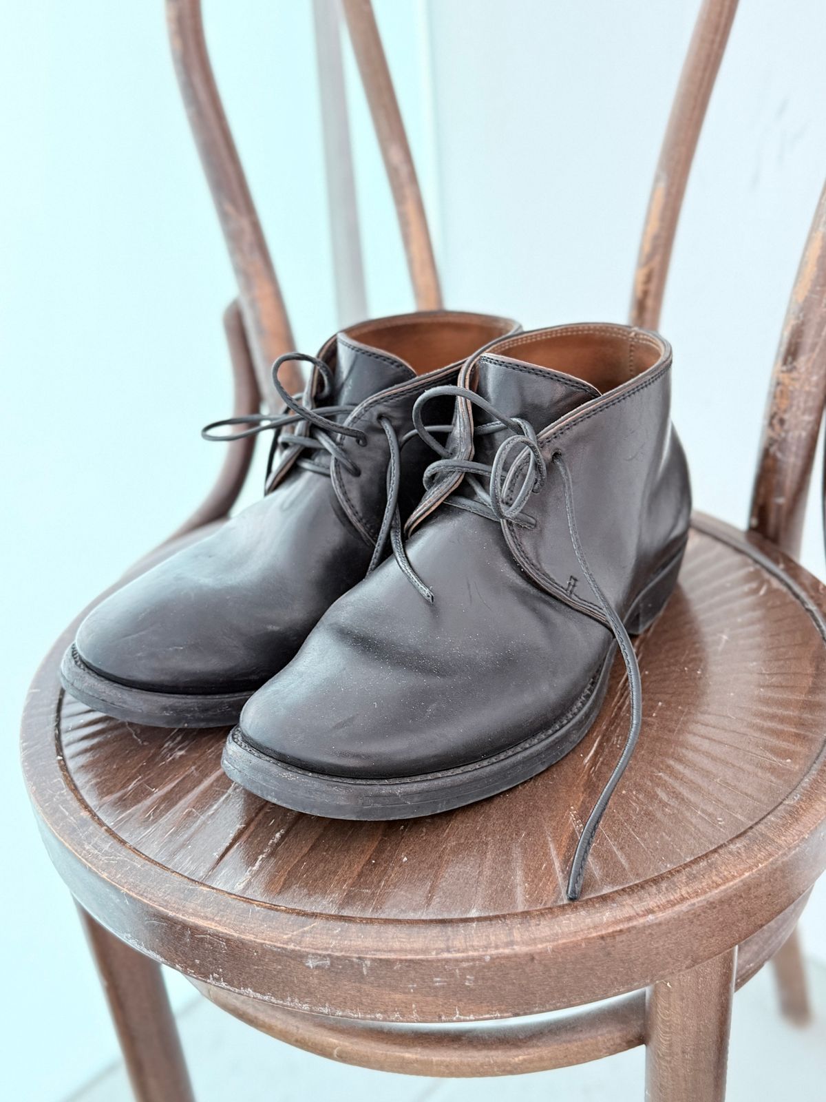 Photo by Sips on March 8, 2026 of the Flame Panda Chukkas in Maryam Natural Horsebutt Overdyed Brown then Black.