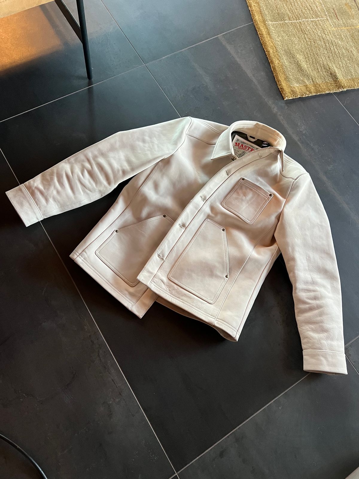 Photo by Tipples_and_drams on February 25, 2025 of the Master Supply Field Jacket in Unknown Natural Veg Tan Cowhide.