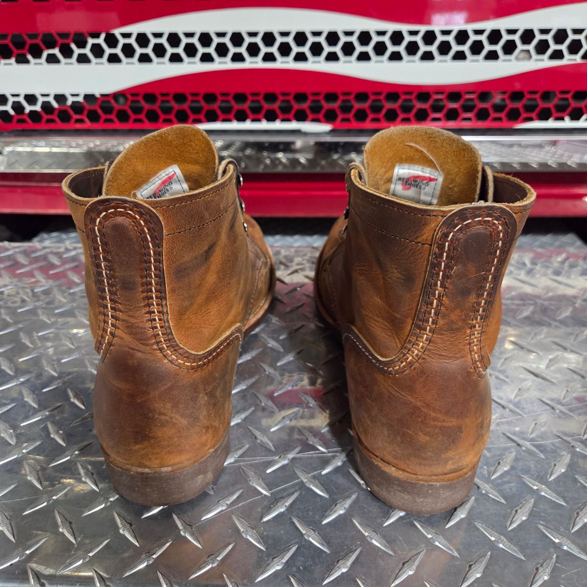 Photo by curtisheinze on January 3, 2026 of the Red Wing Iron Ranger in S.B. Foot Copper Rough and Tough & Horween Orange Predator.
