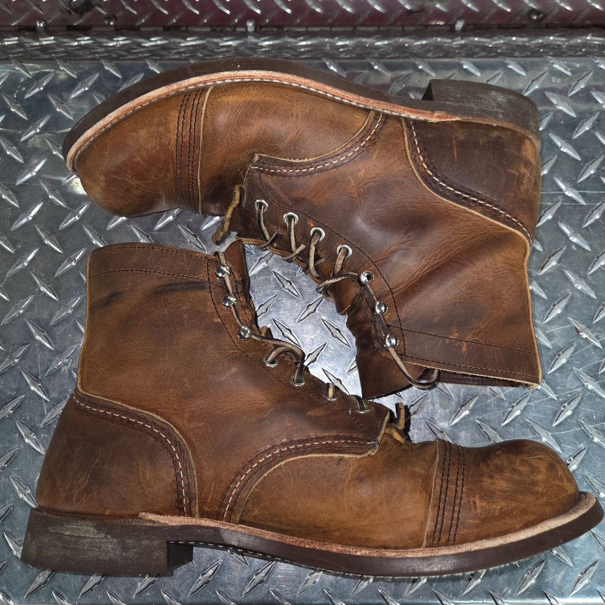 Photo by curtisheinze on January 3, 2026 of the Red Wing Iron Ranger in S.B. Foot Copper Rough and Tough & Horween Orange Predator.