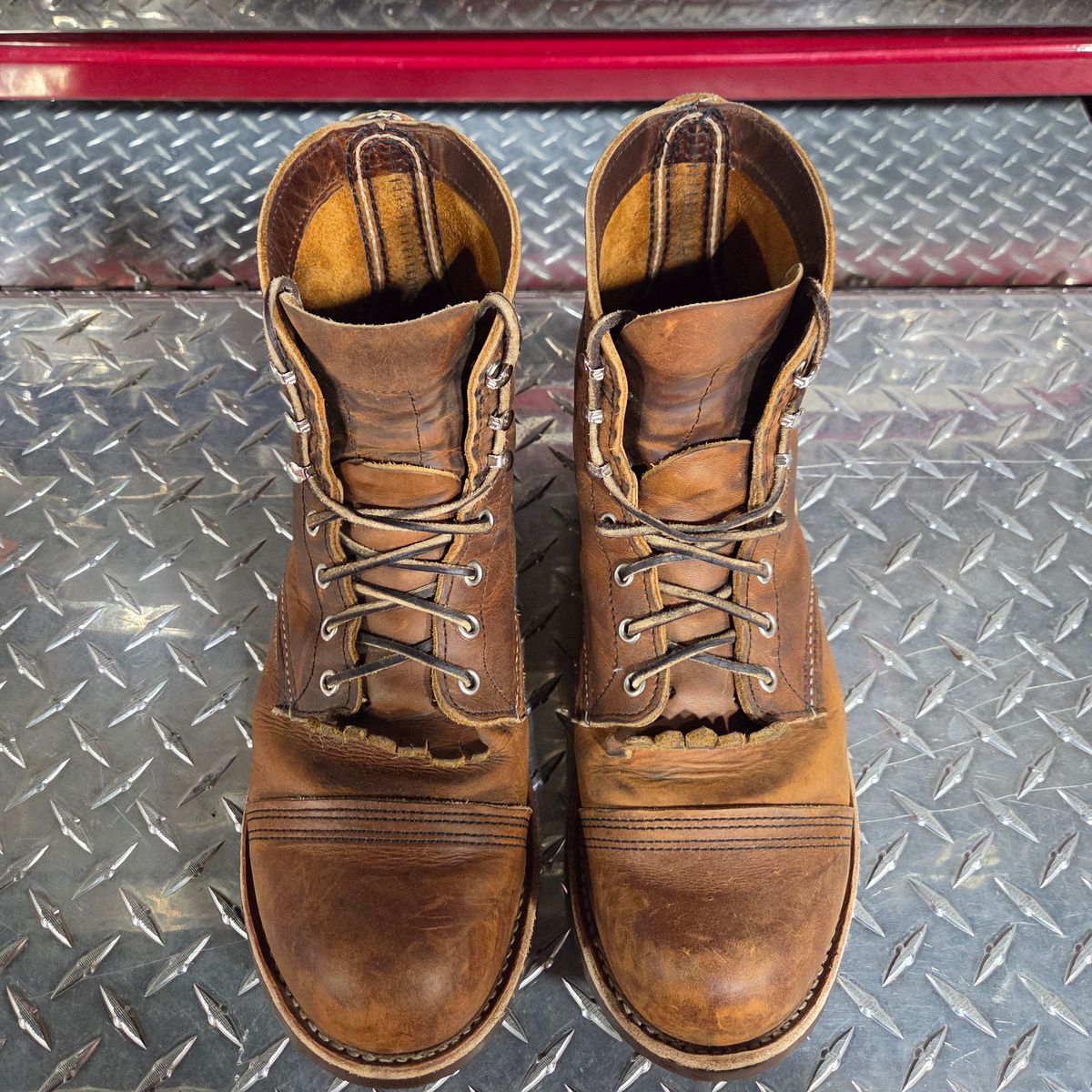Photo by curtisheinze on January 3, 2026 of the Red Wing Iron Ranger in S.B. Foot Copper Rough and Tough & Horween Orange Predator.