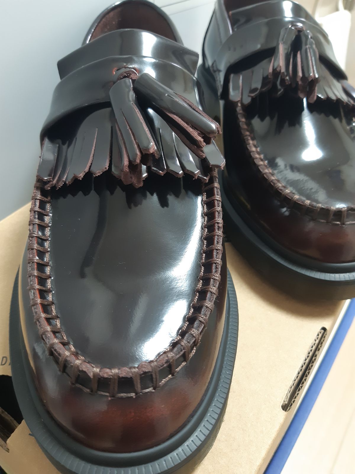 Photo by mimo on July 10, 2023 of the Dr. Martens Loafer in Red.