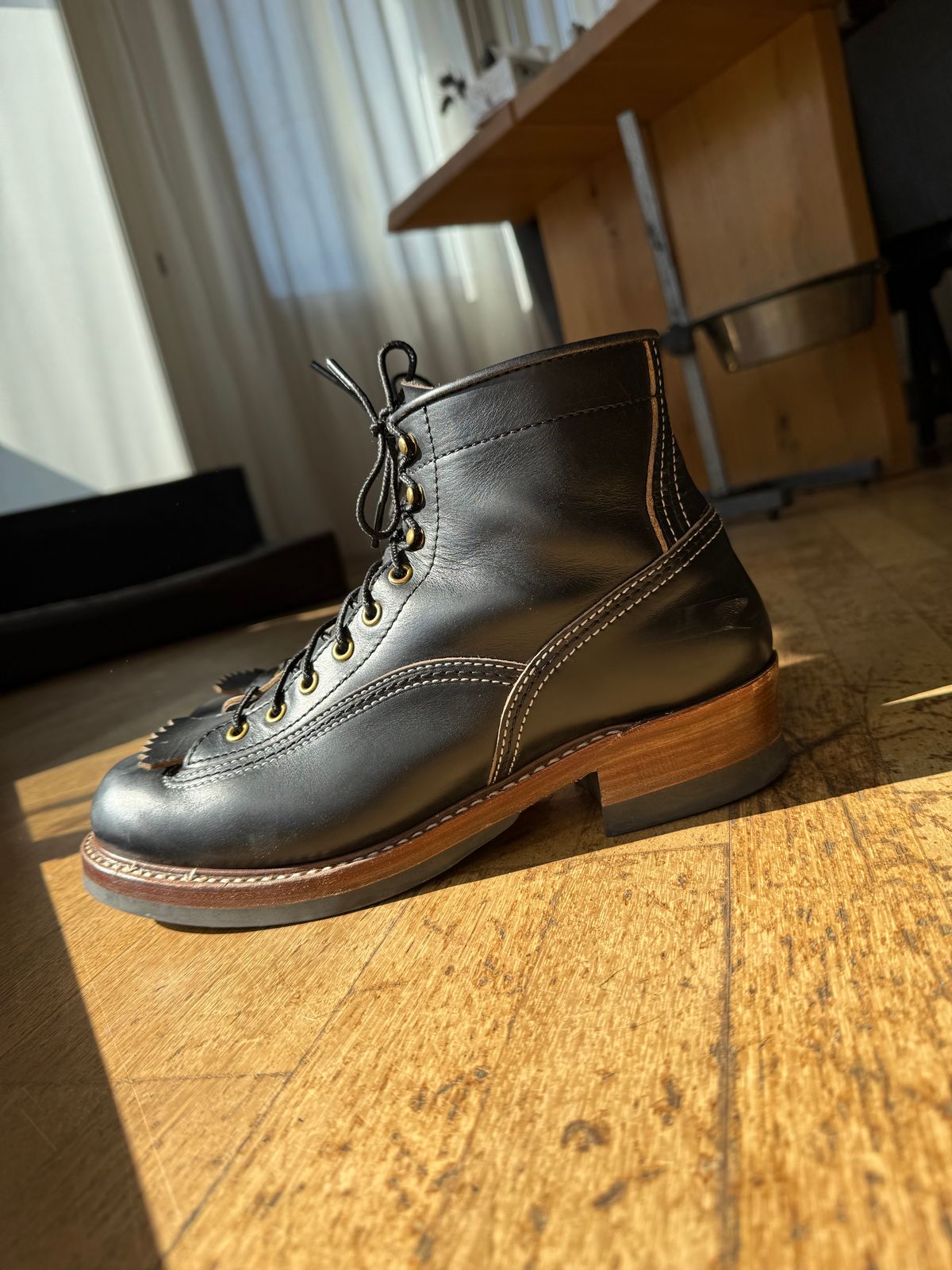 Photo by Miimo on March 3, 2025 of the John Lofgren Donkey Puncher Boots in Horween Black Chromexcel.