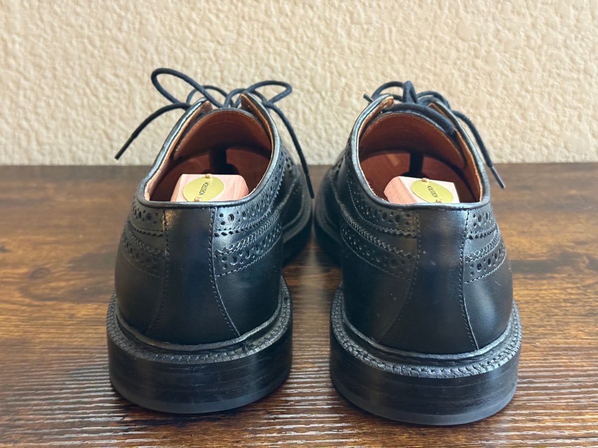 Photo by sierraStyled on December 23, 2025 of the Grant Stone Longwing in Horween Black Chromexcel.