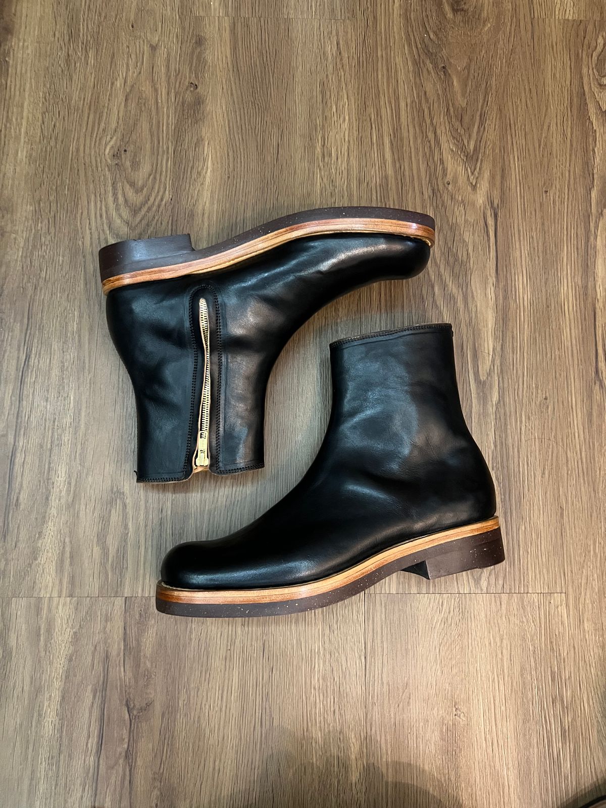 Photo by bangbenana on July 19, 2025 of the Briselblack The Stride Side Zip Boots in Maryam Natural Horsebutt Overdyed Black.