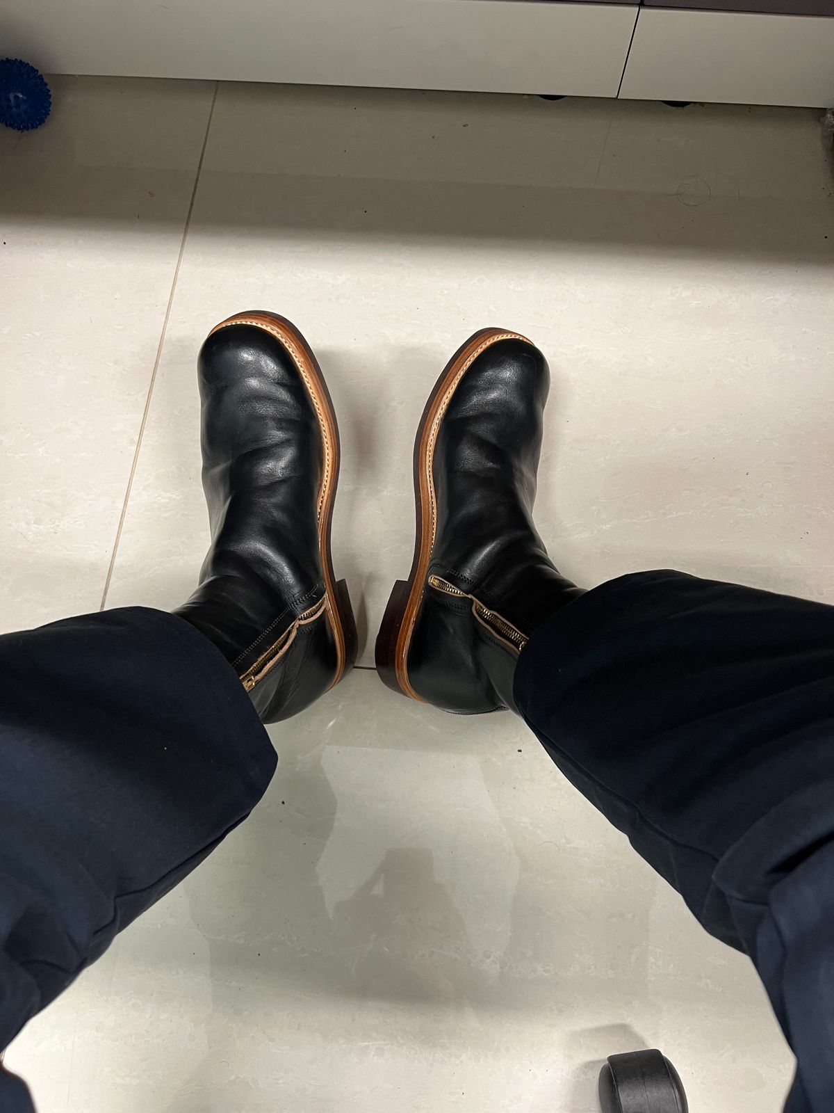 Photo by bangbenana on July 23, 2025 of the Briselblack The Stride Side Zip Boots in Maryam Natural Horsebutt Overdyed Black.