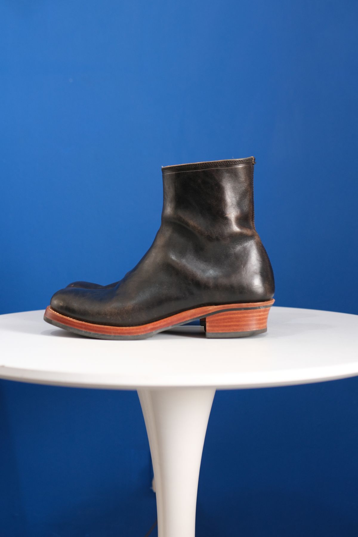 Photo by anakdenim on October 1, 2025 of the Briselblack The Stride Side Zip Boots in Maryam Natural Horsebutt Overdyed Black.