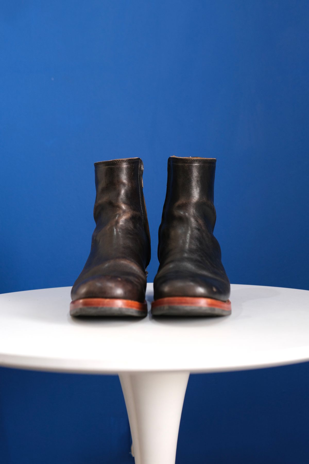 Photo by anakdenim on October 1, 2025 of the Briselblack The Stride Side Zip Boots in Maryam Natural Horsebutt Overdyed Black.