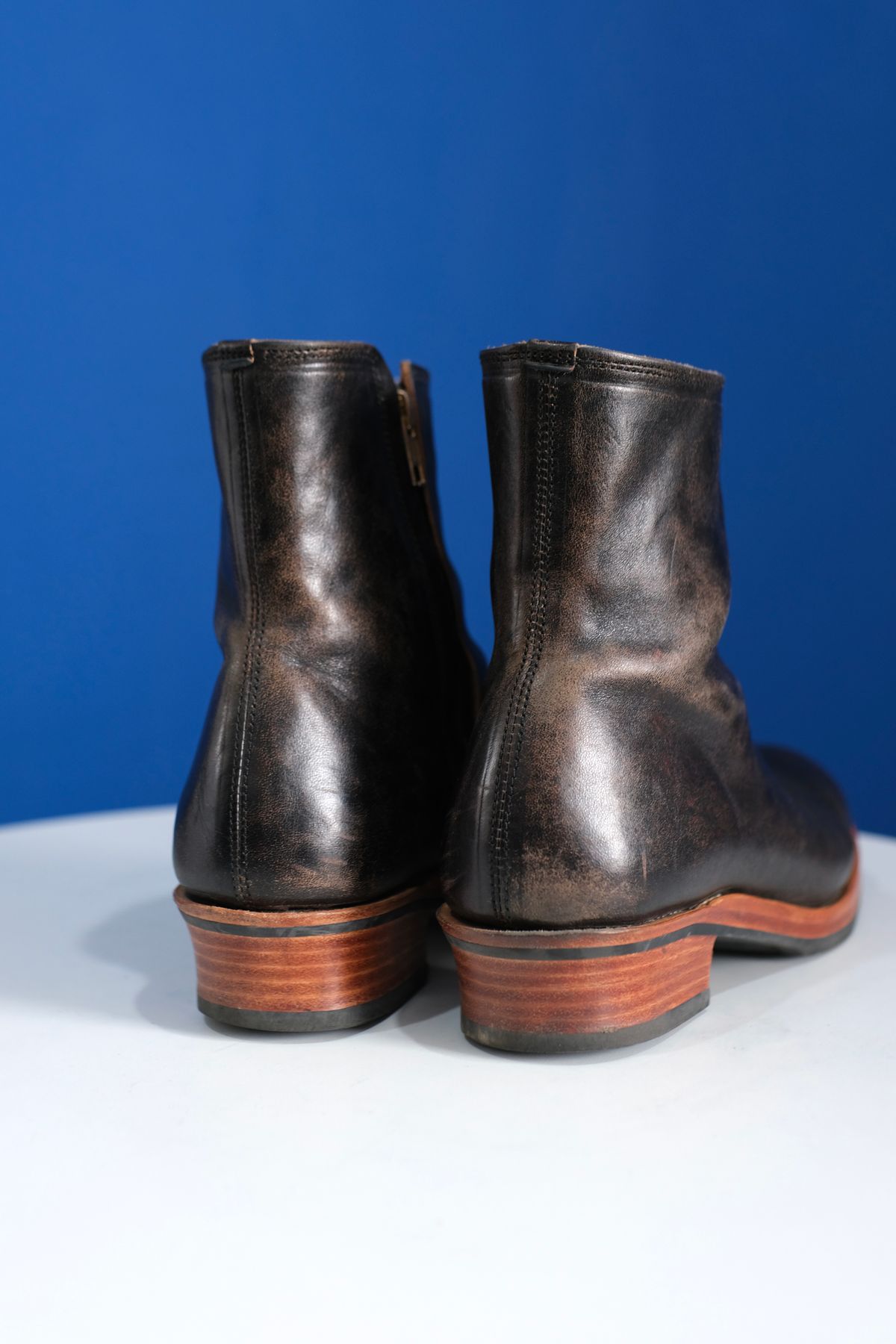 Photo by anakdenim on October 1, 2025 of the Briselblack The Stride Side Zip Boots in Maryam Natural Horsebutt Overdyed Black.
