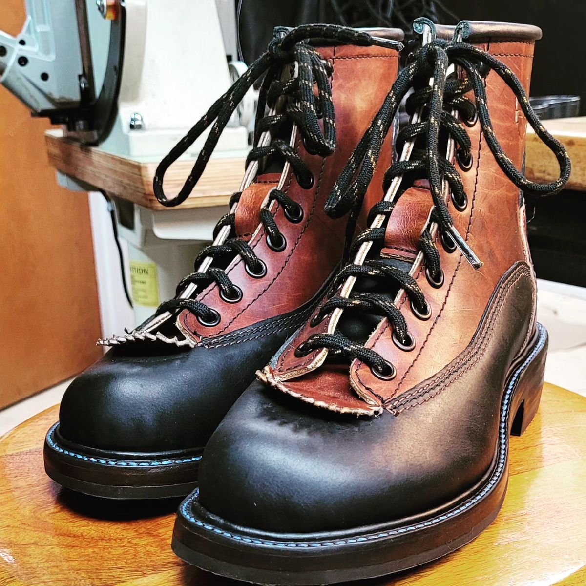 Photo by poorboysoles on October 6, 2024 of the Poor Boy Soles Bespoke Shoe Co. Monkey Boot in Black Matte Trooper & Medium Brown Worn Baseball.