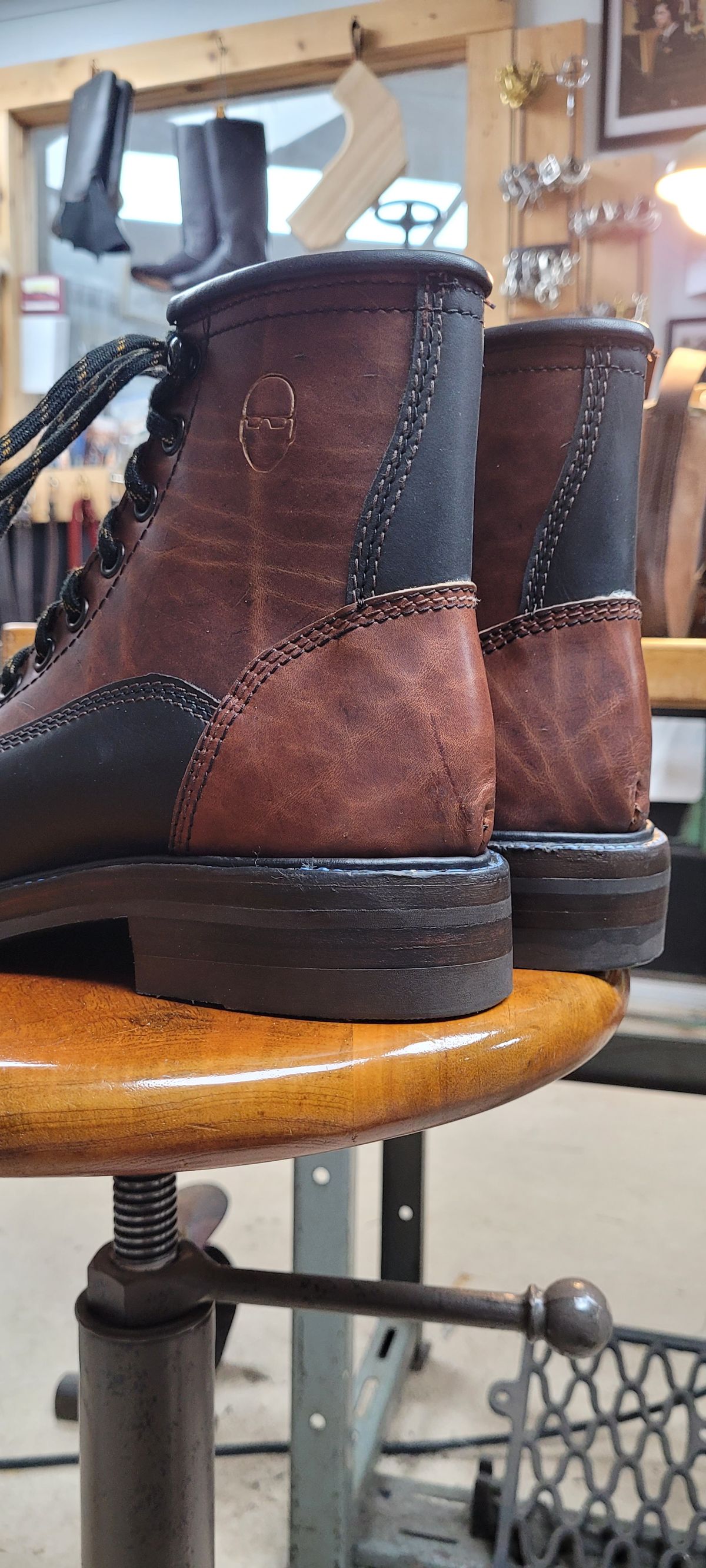 Photo by poorboysoles on October 6, 2024 of the Poor Boy Soles Bespoke Shoe Co. Monkey Boot in Black Matte Trooper & Medium Brown Worn Baseball.