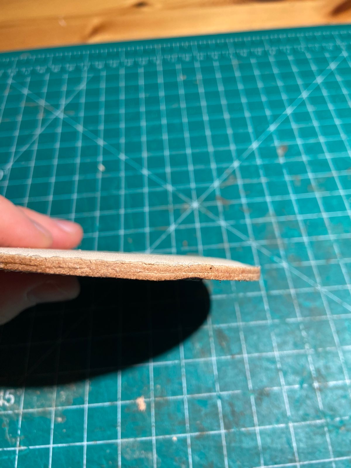 Photo by august_september on October 1, 2025 of the Self-Made Drink Coaster in tandy 3-4oz natural veg tan.