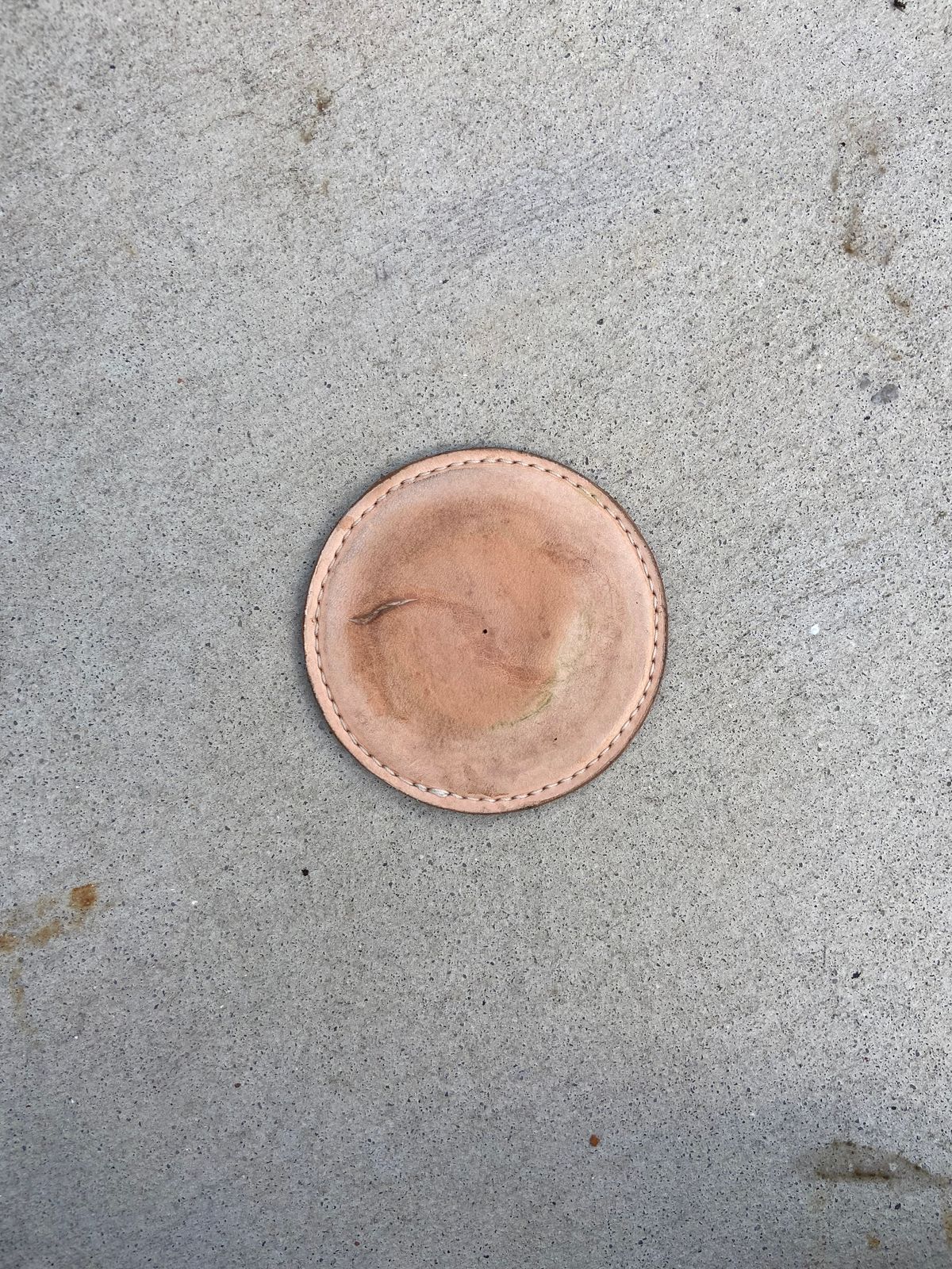 Photo by august_september on November 4, 2025 of the Self-Made Drink Coaster in tandy 3-4oz natural veg tan.