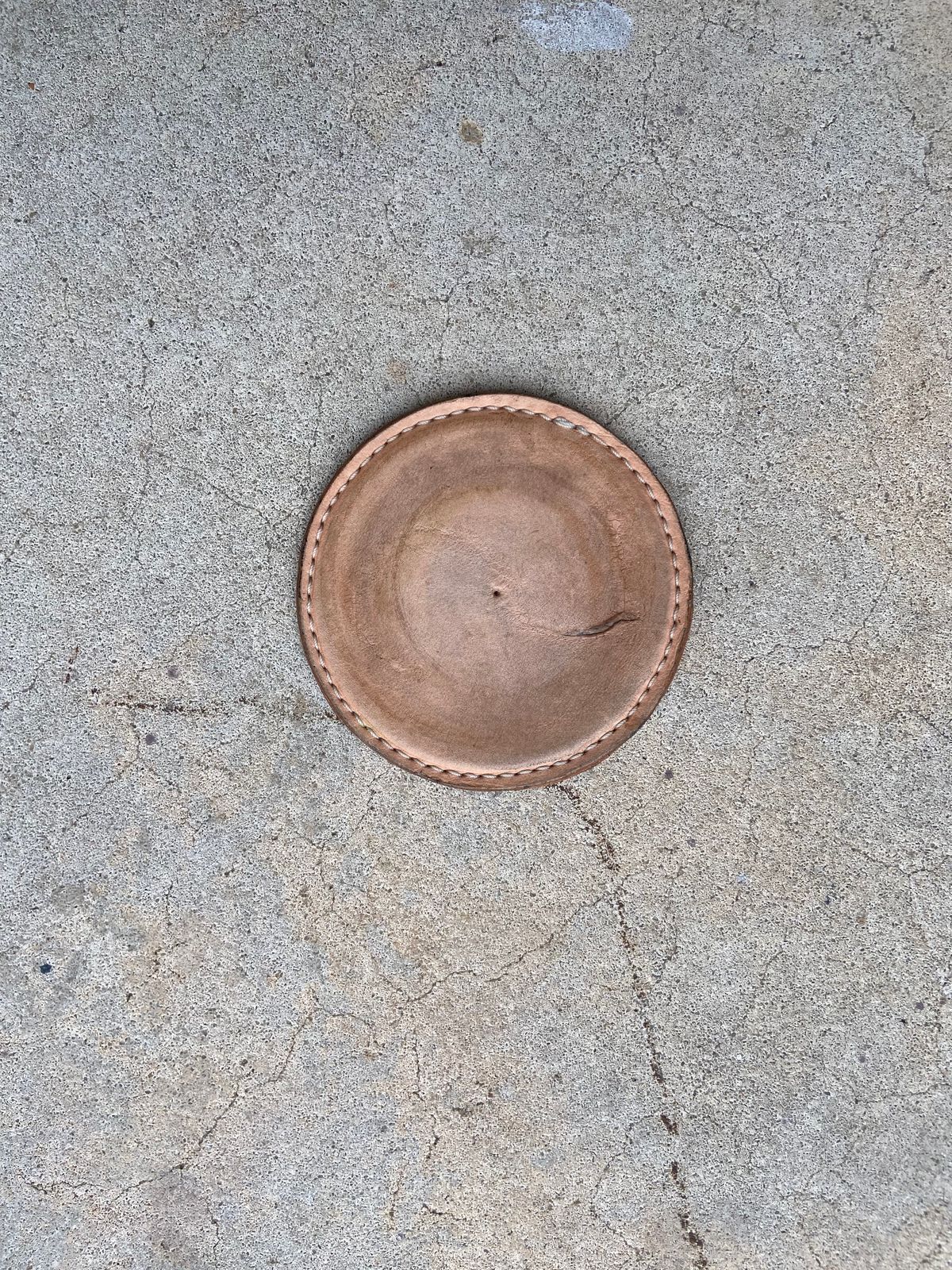 Photo by august_september on December 2, 2025 of the Self-Made Drink Coaster in tandy 3-4oz natural veg tan.