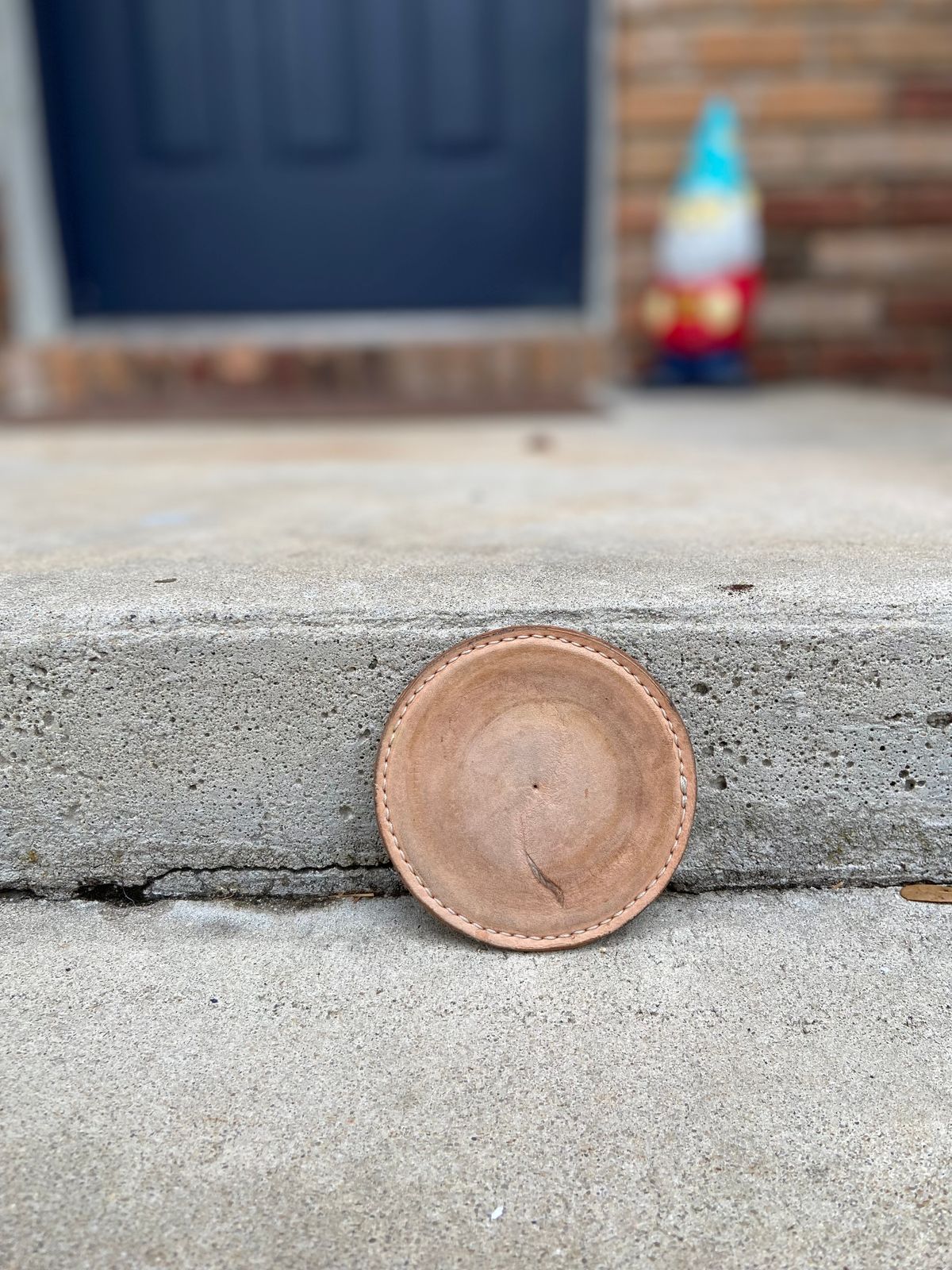 Photo by august_september on December 2, 2025 of the Self-Made Drink Coaster in tandy 3-4oz natural veg tan.