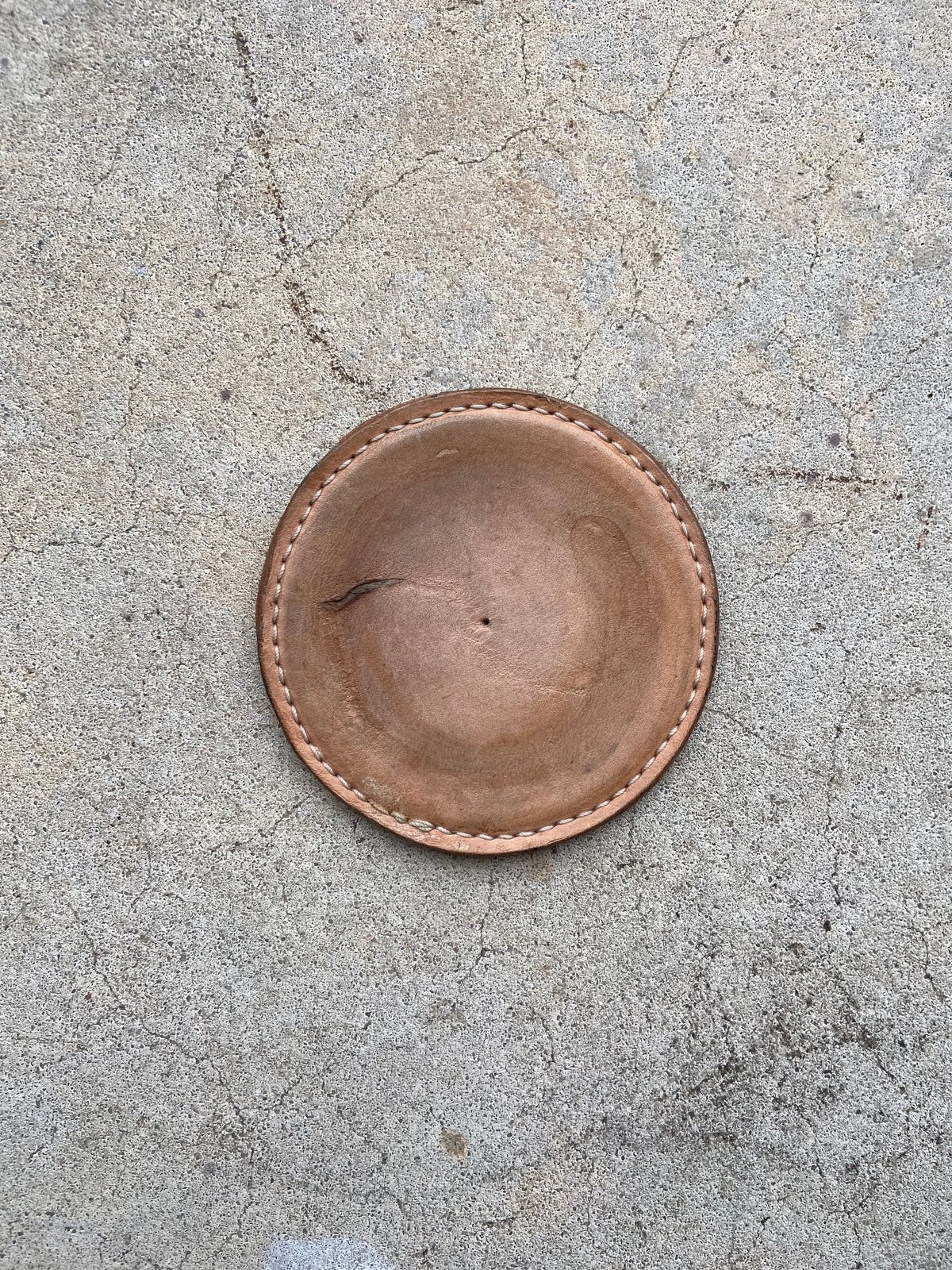 Photo by august_september on February 5, 2026 of the Self-Made Drink Coaster in tandy 3-4oz natural veg tan.