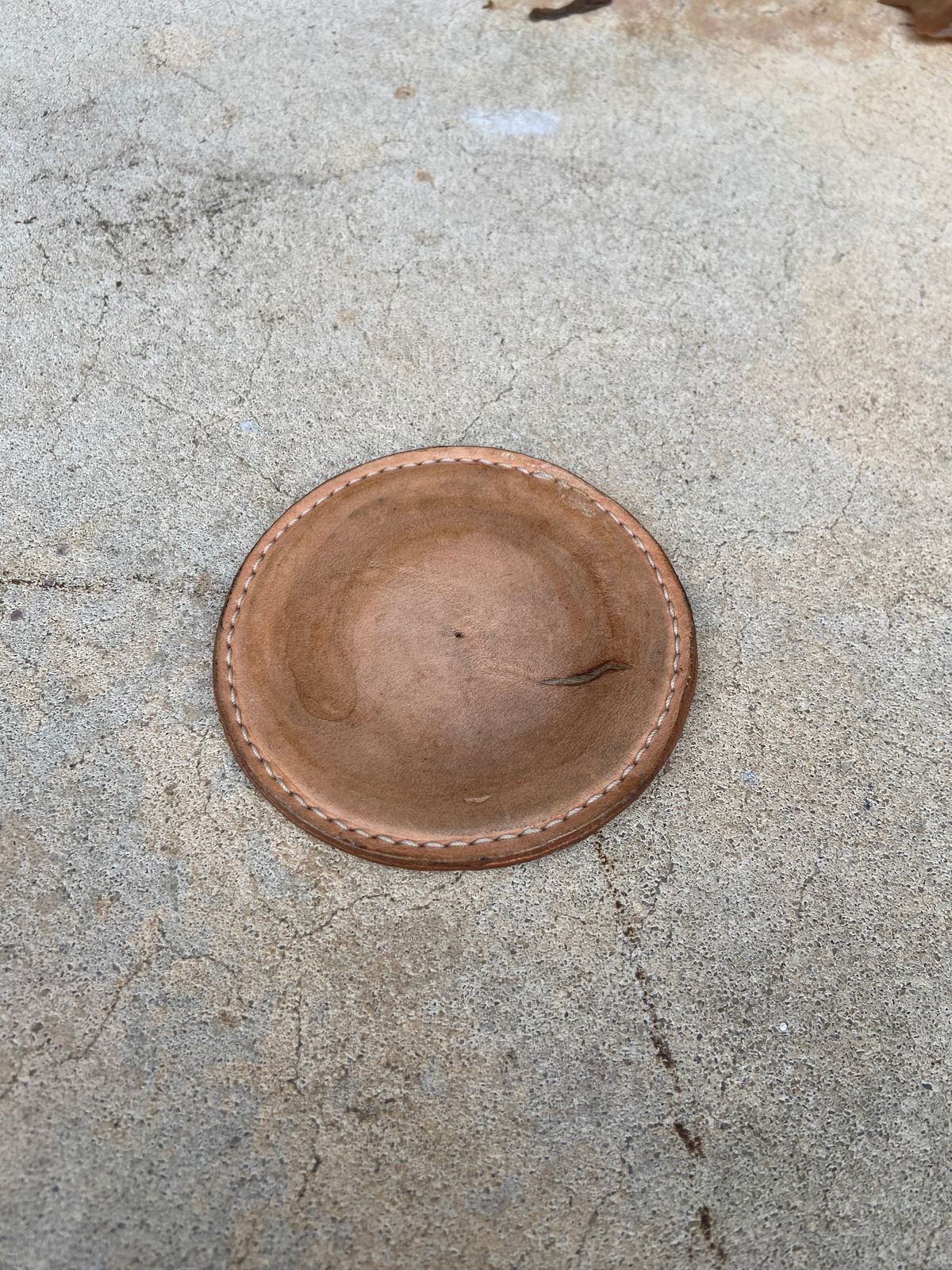 Photo by august_september on February 5, 2026 of the Self-Made Drink Coaster in tandy 3-4oz natural veg tan.