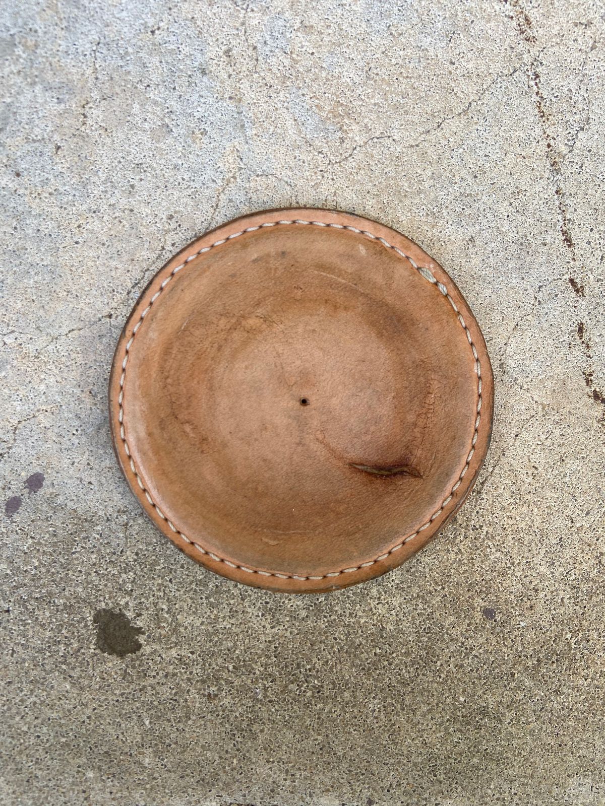 Photo by august_september on April 3, 2026 of the Self-Made Drink Coaster in tandy 3-4oz natural veg tan.