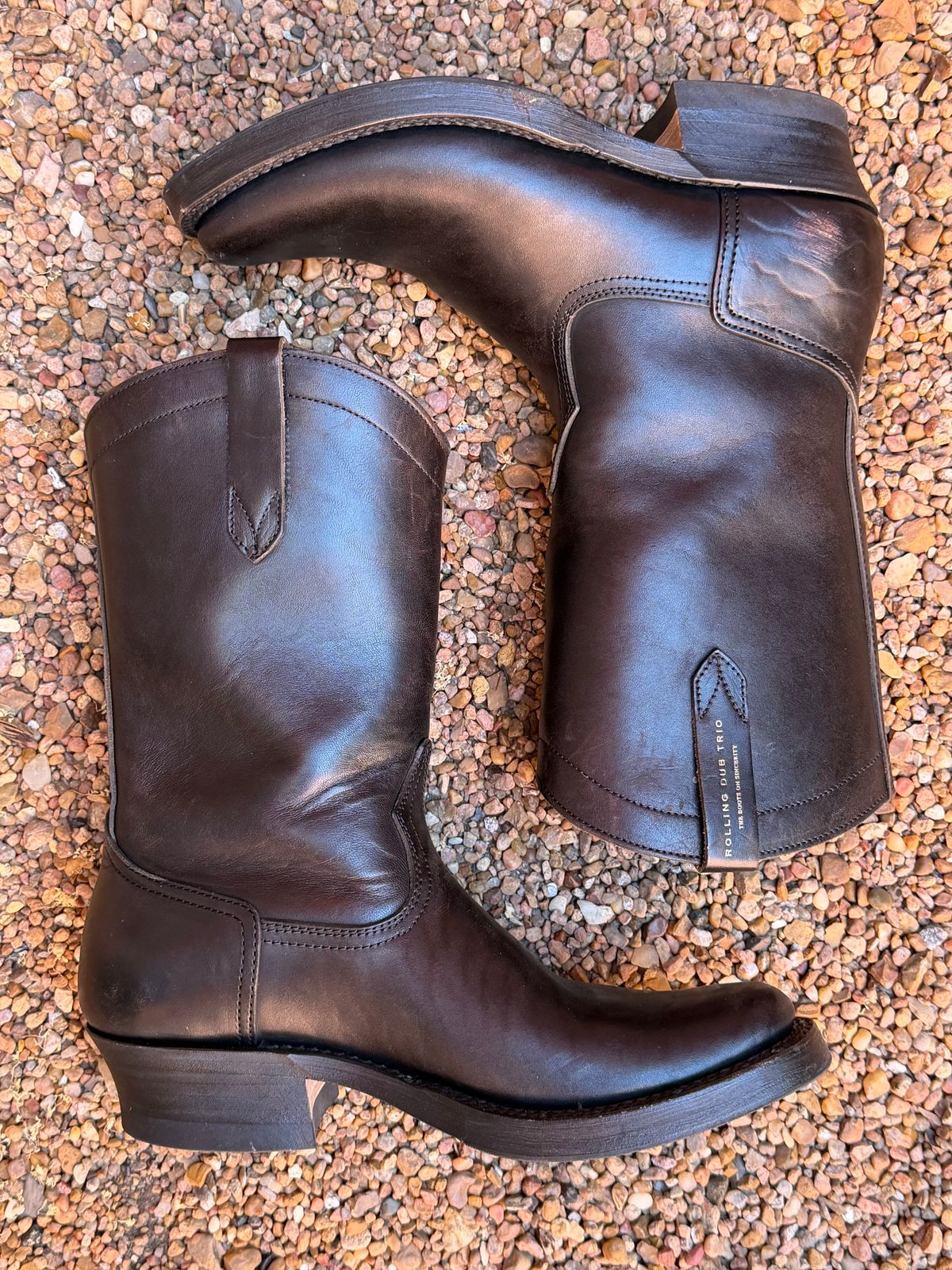 Photo by central209 on January 5, 2026 of the Rolling Dub Trio Loro Western Boot in Black Horse Butt #1010.