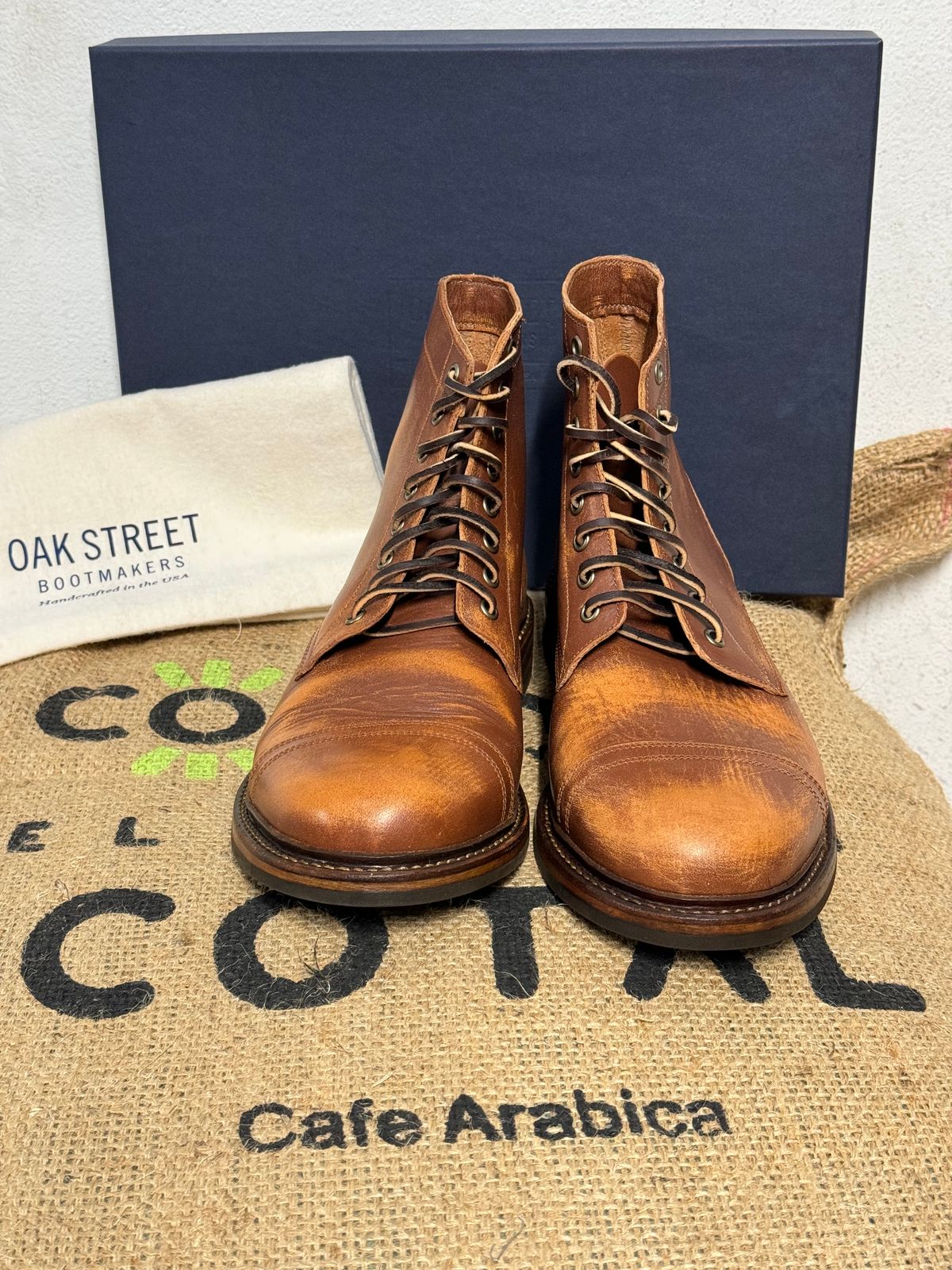 Photo by missouridenimdad on May 31, 2024 of the Oak Street Bootmakers Cap Toe Trench Boot in Tempesti Brown Overdye Camello Asportabile.