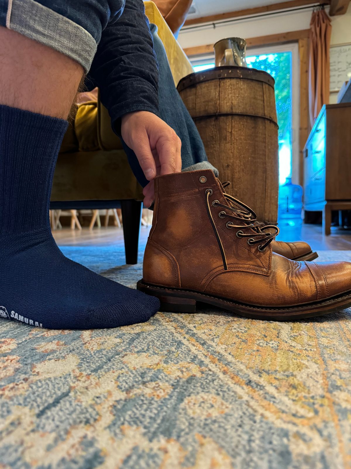 Photo by missouridenimdad on June 12, 2024 of the Oak Street Bootmakers Cap Toe Trench Boot in Tempesti Brown Overdye Camello Asportabile.