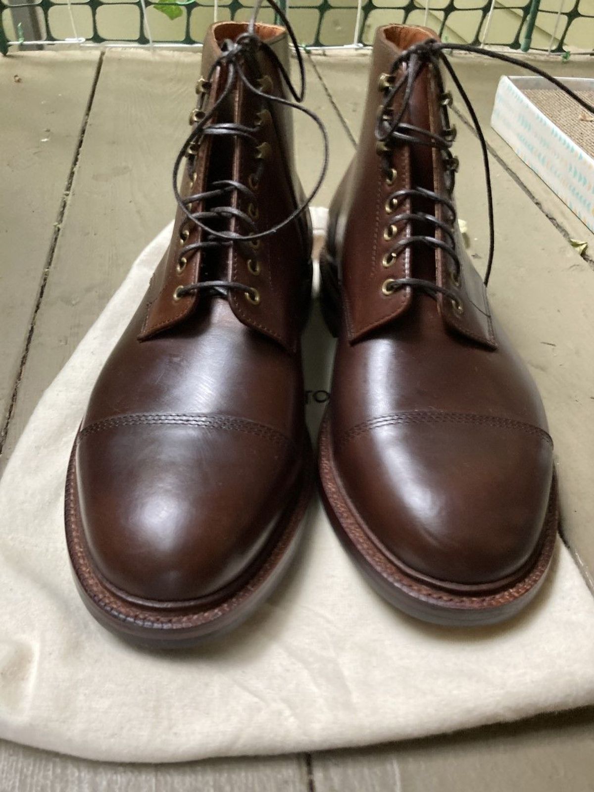 Photo by patinathunderdome on October 1, 2021 of the Grant Stone Cap Toe Boot in Horween Crimson Chromexcel.