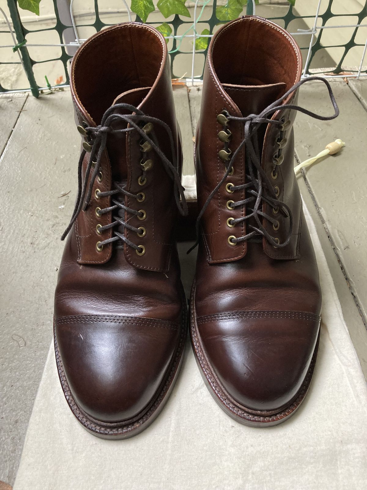 Photo by patinathunderdome on January 3, 2022 of the Grant Stone Cap Toe Boot in Horween Crimson Chromexcel.