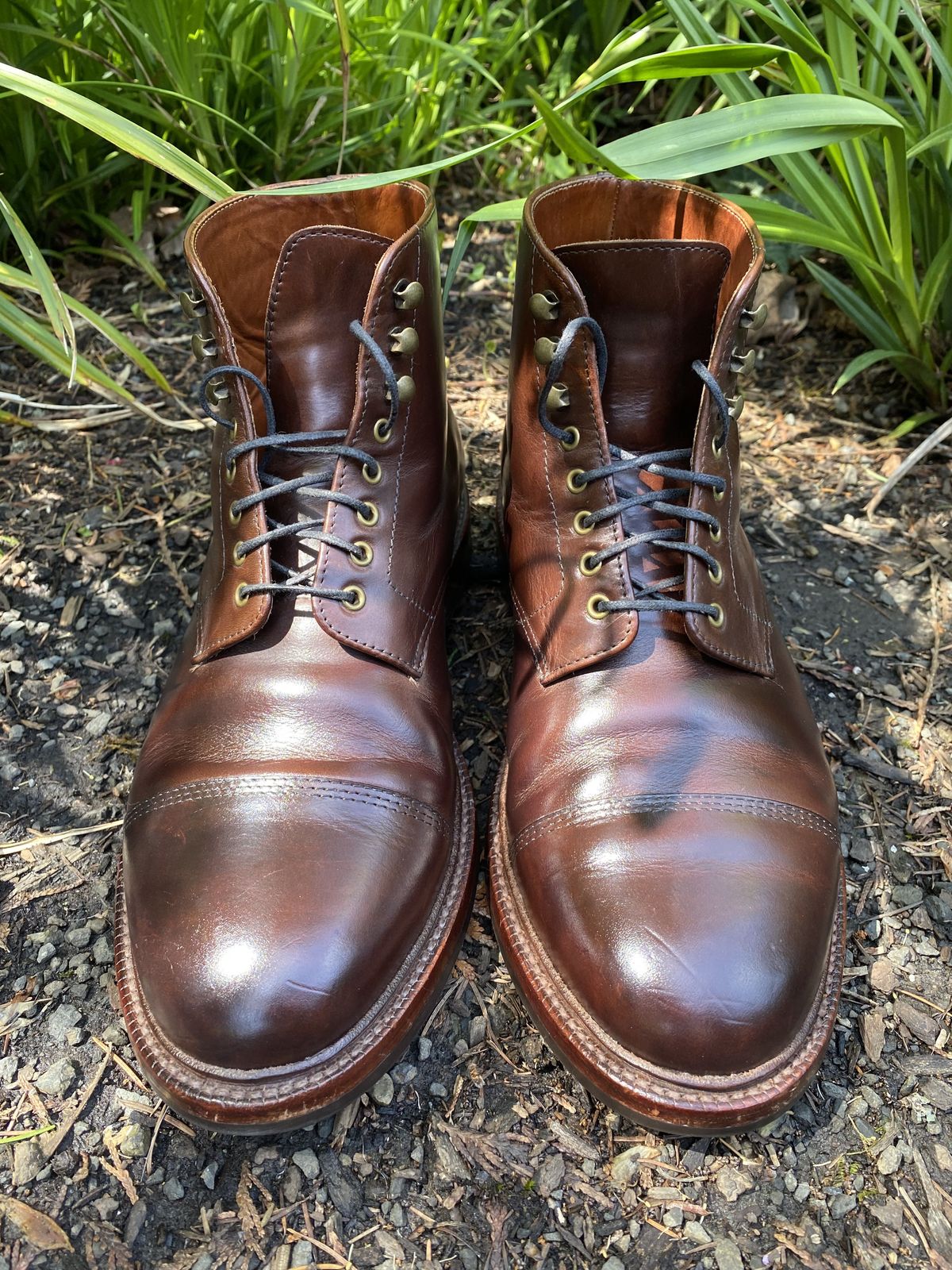 Photo by patinathunderdome on May 1, 2022 of the Grant Stone Cap Toe Boot in Horween Crimson Chromexcel.