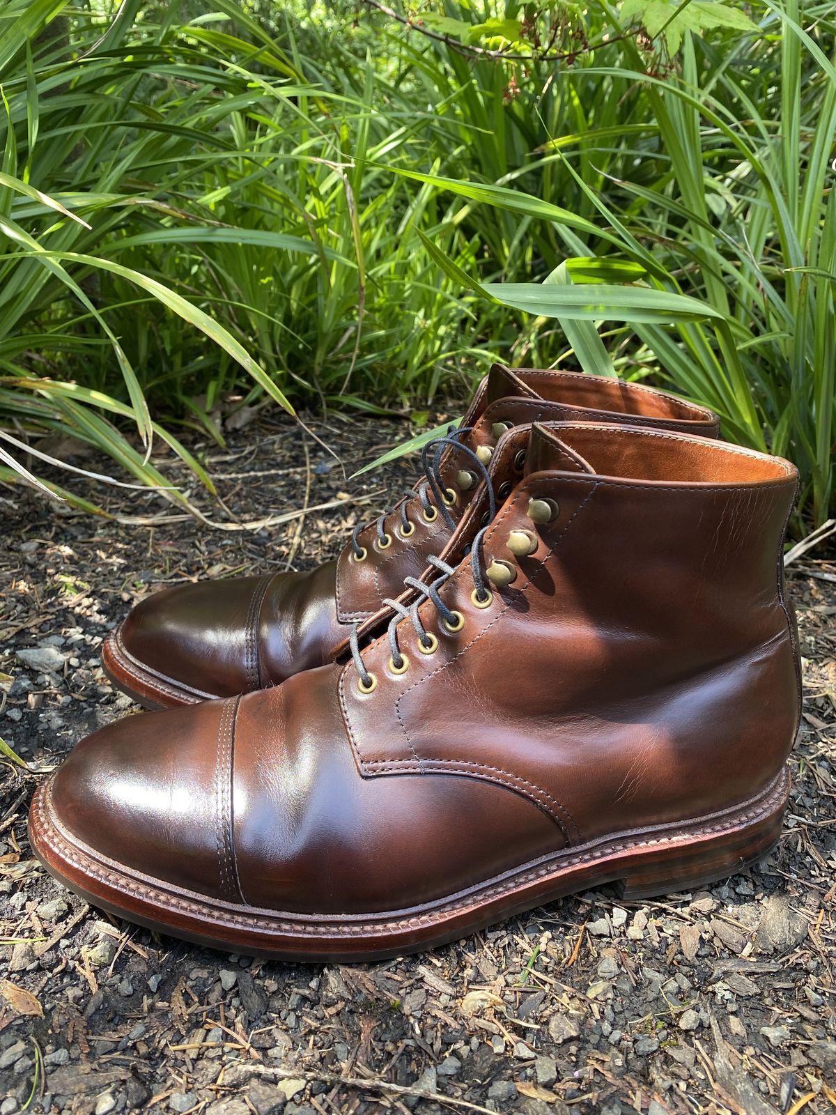 Photo by patinathunderdome on May 1, 2022 of the Grant Stone Cap Toe Boot in Horween Crimson Chromexcel.