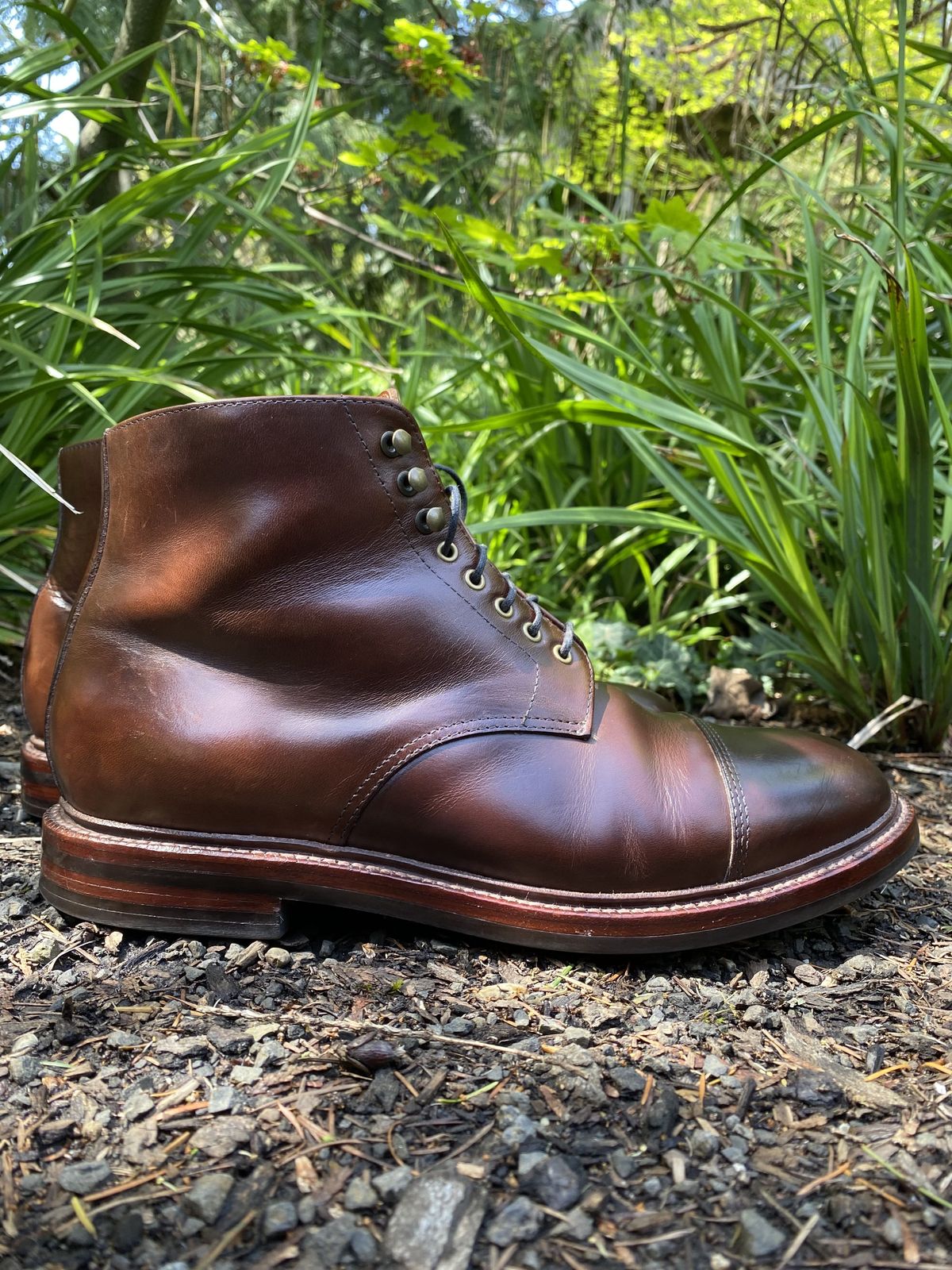 Photo by patinathunderdome on May 1, 2022 of the Grant Stone Cap Toe Boot in Horween Crimson Chromexcel.