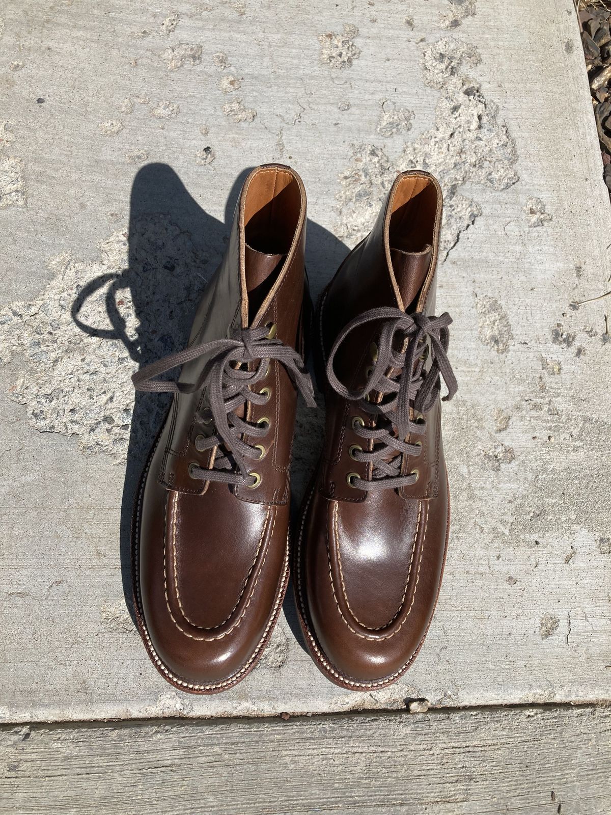Photo by patinathunderdome on October 1, 2021 of the Grant Stone Brass Boot in Horween Crimson Chromexcel.