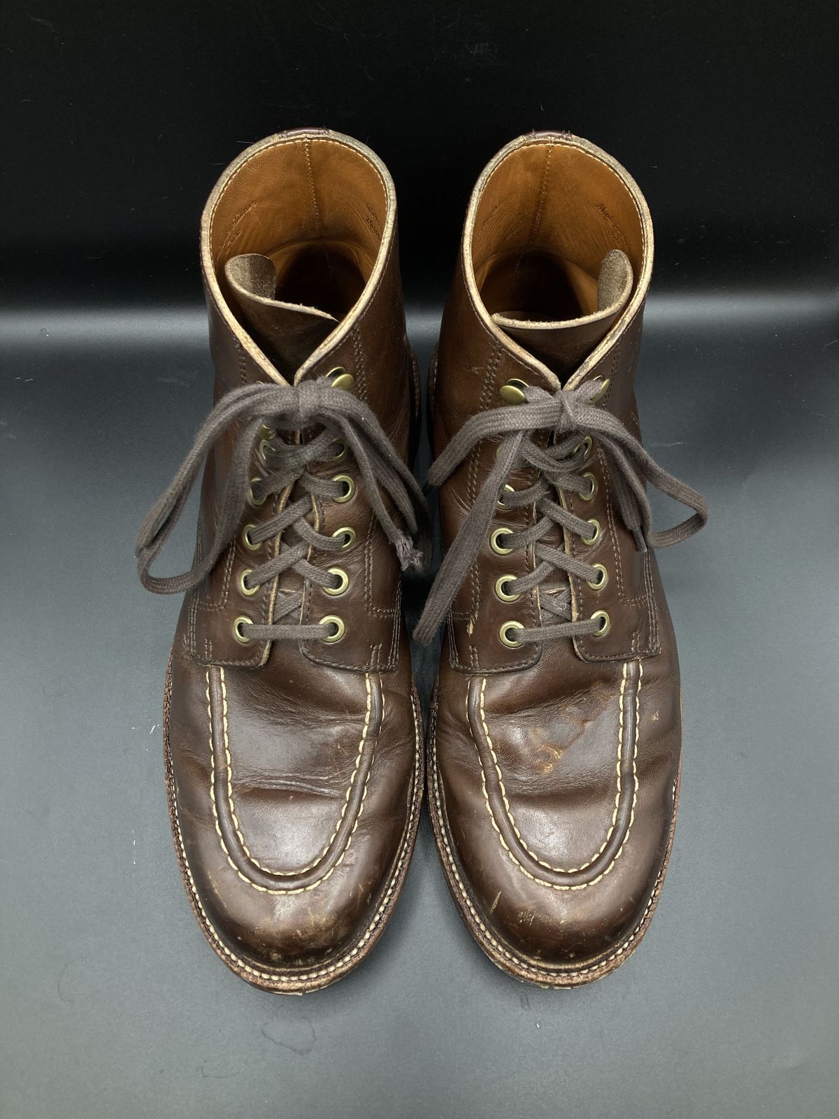 Photo by patinathunderdome on November 6, 2021 of the Grant Stone Brass Boot in Horween Crimson Chromexcel.