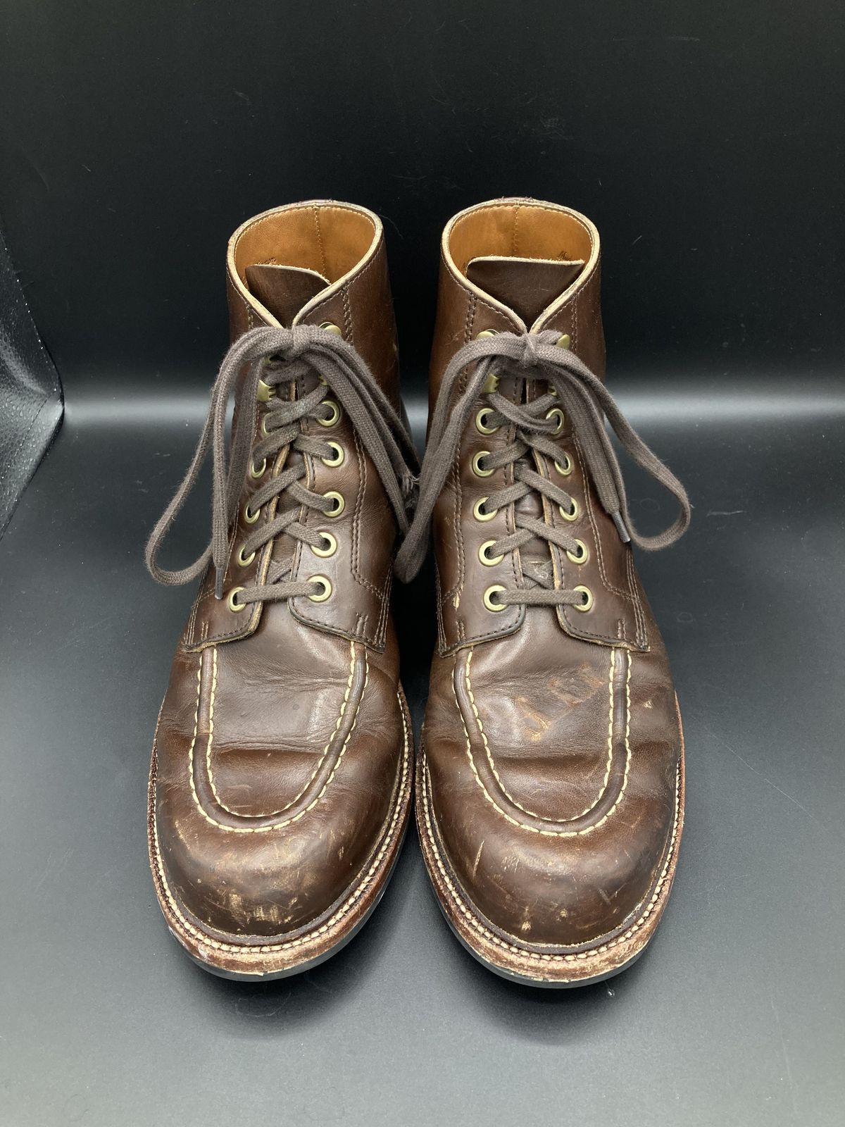 Photo by patinathunderdome on November 6, 2021 of the Grant Stone Brass Boot in Horween Crimson Chromexcel.
