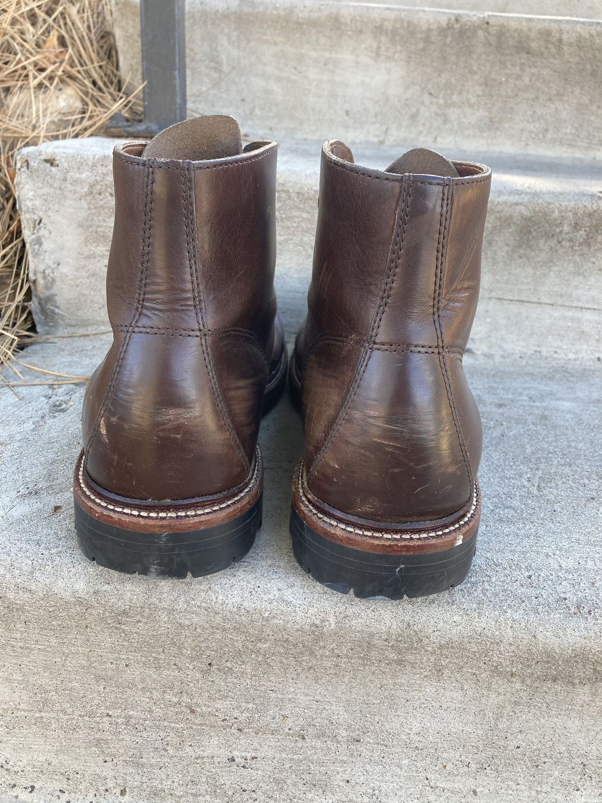 Photo by patinathunderdome on December 5, 2021 of the Grant Stone Brass Boot in Horween Crimson Chromexcel.
