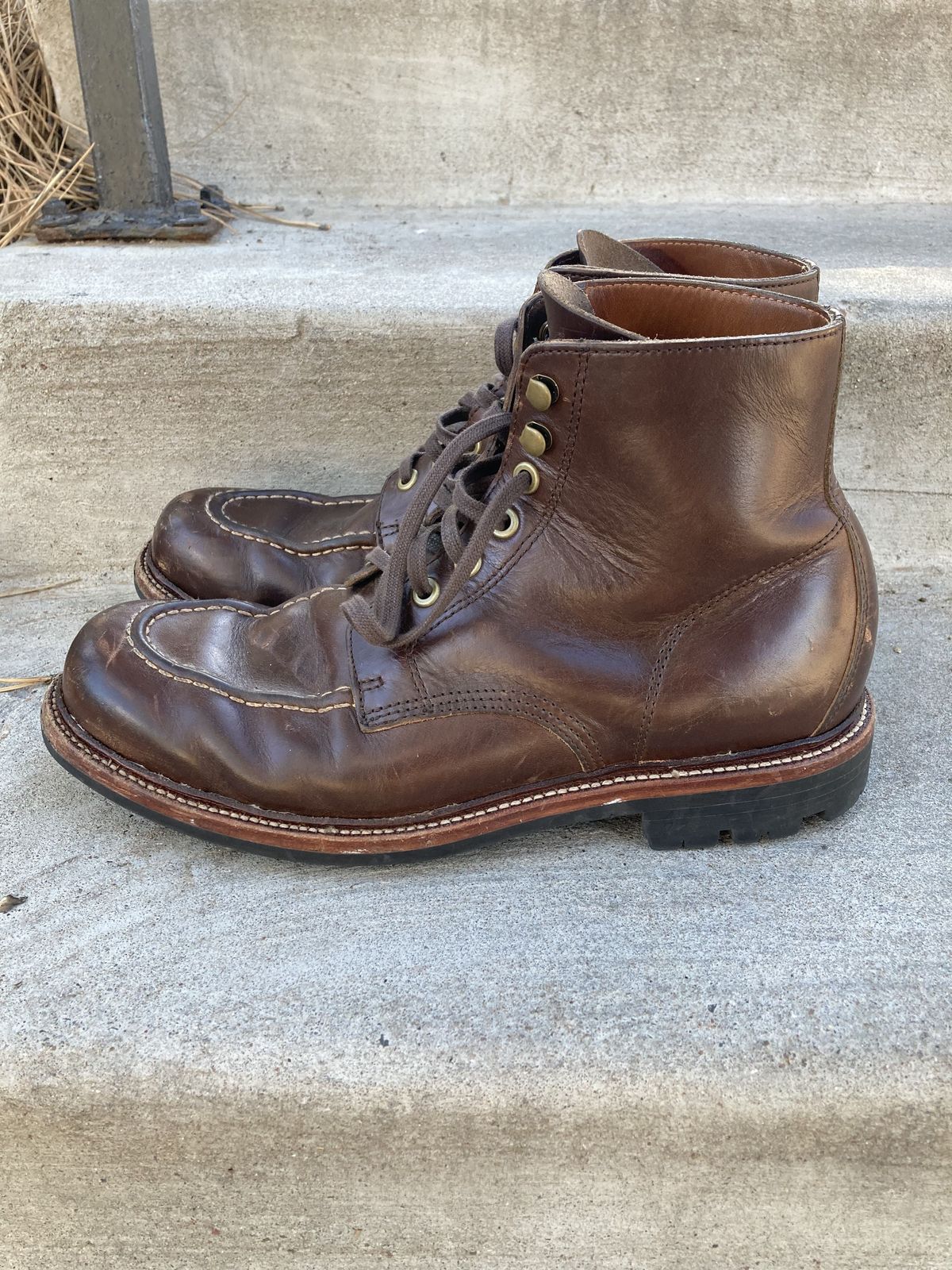 Photo by patinathunderdome on December 5, 2021 of the Grant Stone Brass Boot in Horween Crimson Chromexcel.