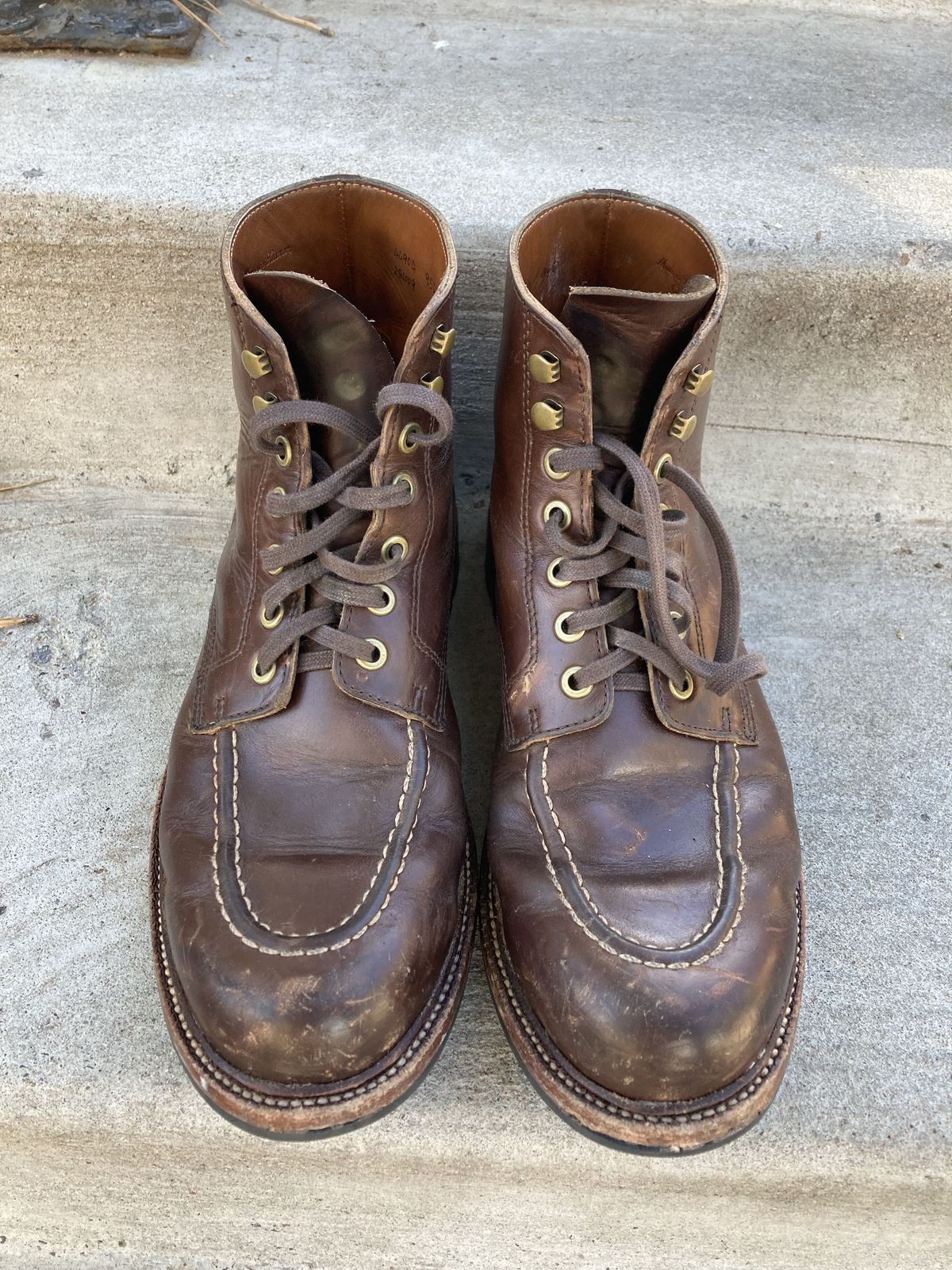 Photo by patinathunderdome on December 5, 2021 of the Grant Stone Brass Boot in Horween Crimson Chromexcel.