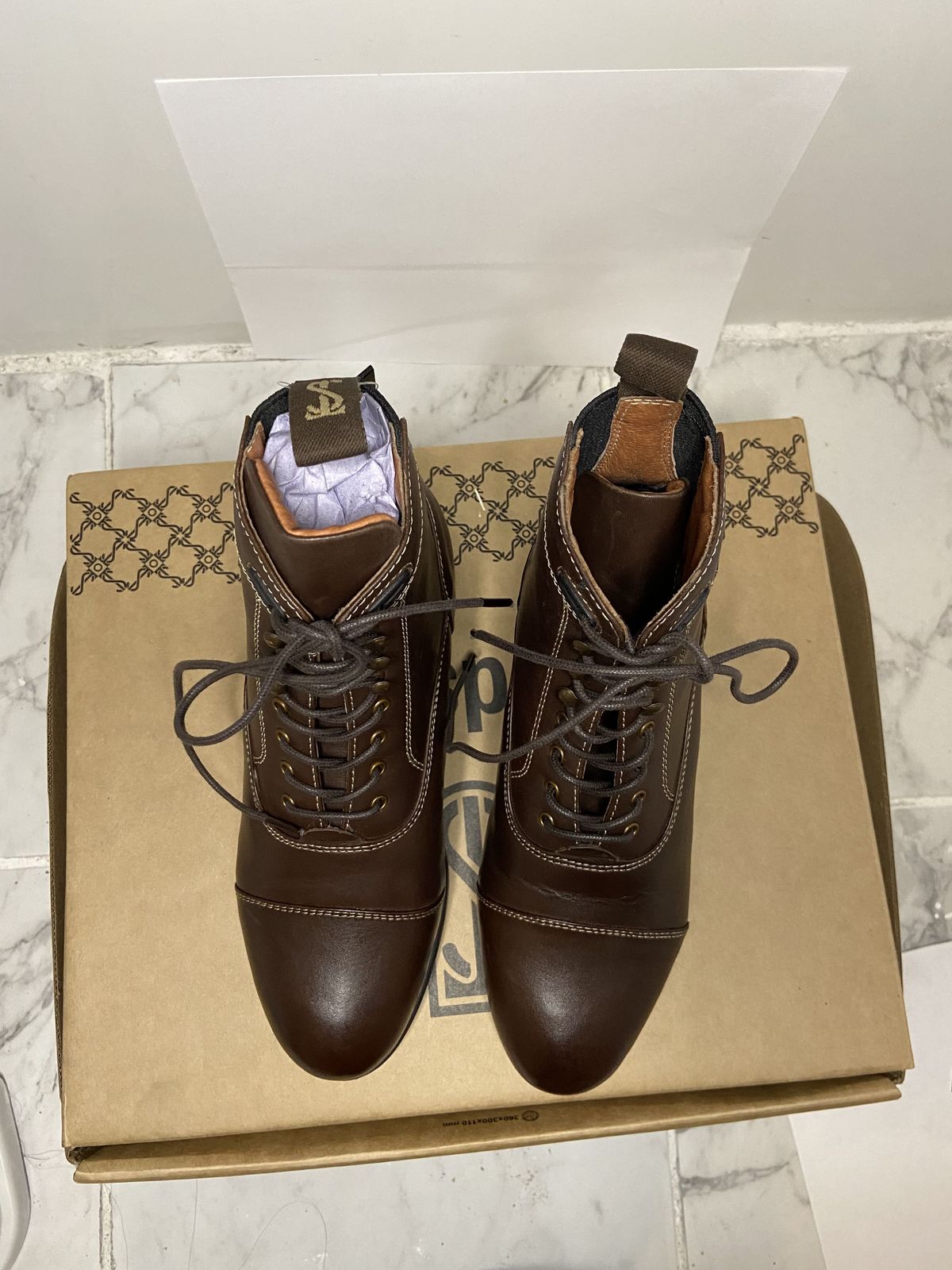 Photo by patinathunderdome on November 2, 2021 of the Tredstep Donatello Paddock Boots Front Lace in Brown Full Grain.