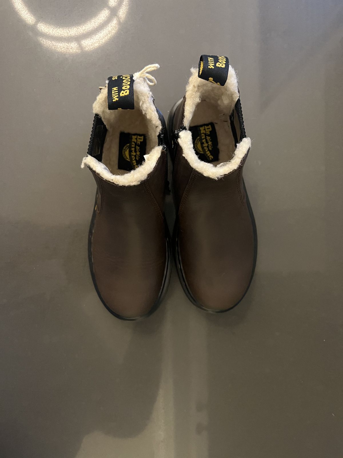 Photo by patinathunderdome on October 2, 2021 of the Dr. Martens Junior 2976 Faux Fur Lined Chelsea Boots in Dark Brown Republic Waterproof.