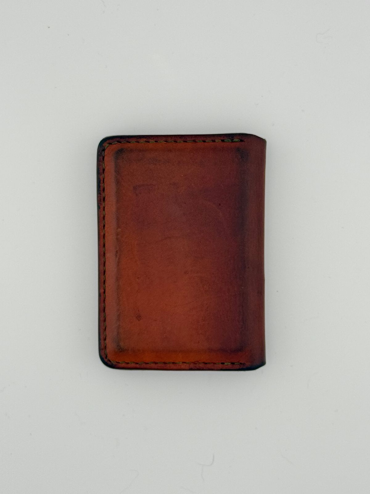 Photo by jeremy.m.boyd on November 5, 2025 of the Jeremy Boyd The JRNY Front Pocket BiFold in Tandy’s Economy Veg-Tan Hand Died English Bridle.