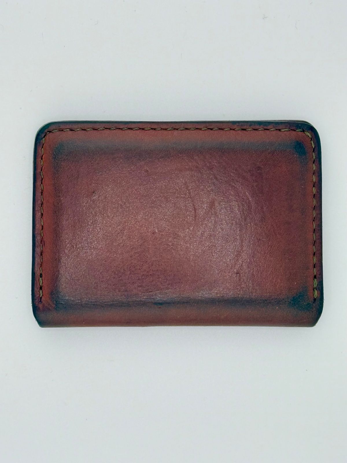 Photo by jeremy.m.boyd on March 3, 2026 of the Jeremy Boyd The JRNY Front Pocket BiFold in Tandy’s Economy Veg-Tan Hand Died English Bridle.