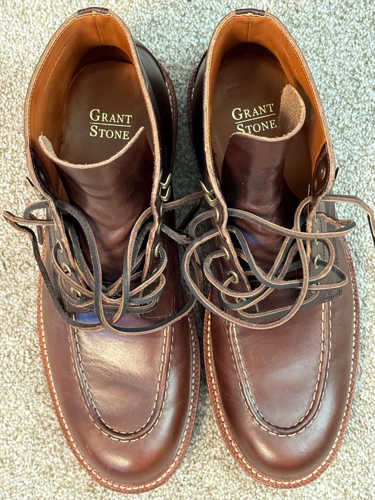 Photo by DMSR64 on December 13, 2024 of the Grant Stone Brass Boot in Horween Crimson Chromexcel.