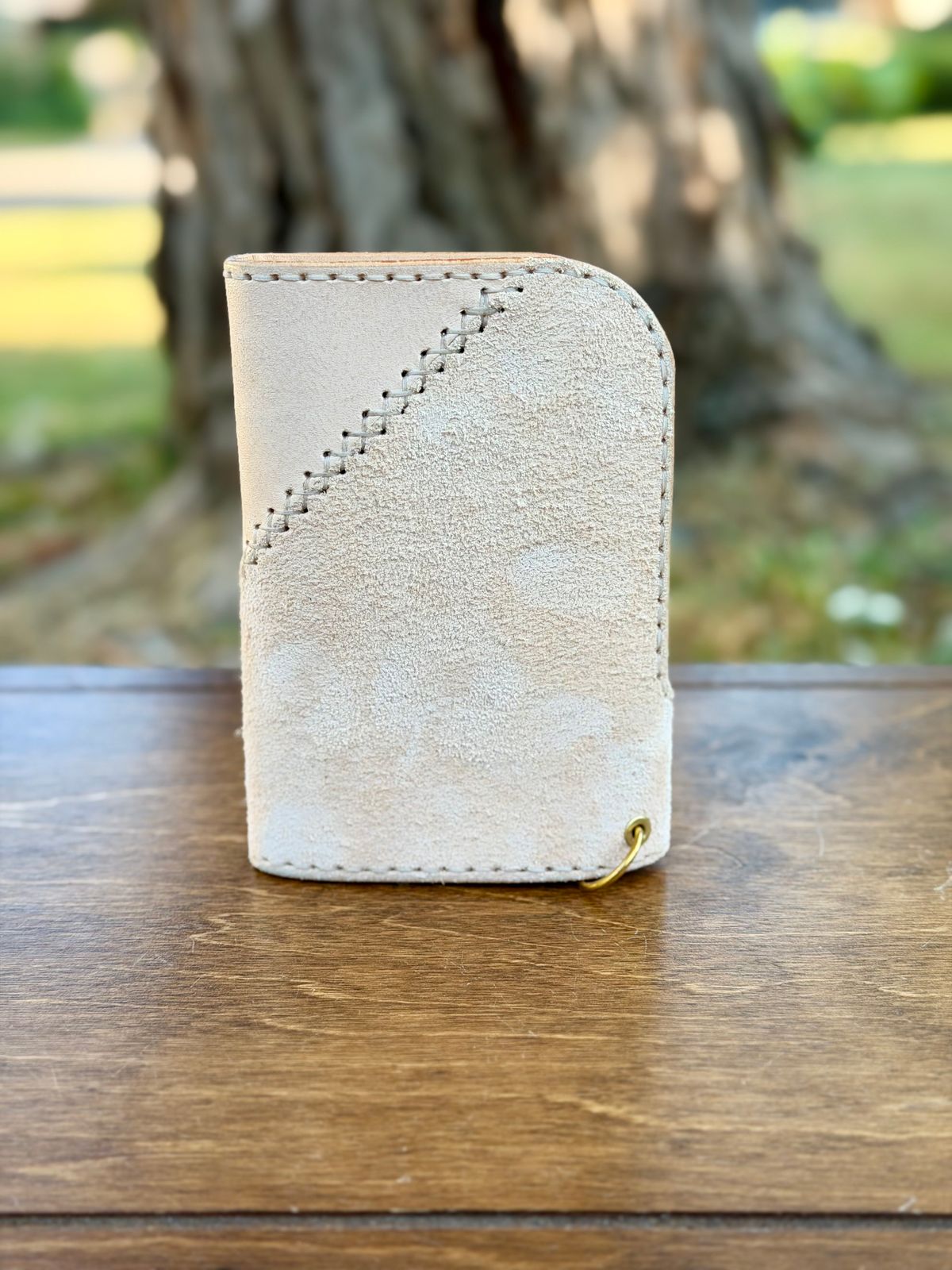 Photo by itsyaboisqueak on October 2, 2025 of the Harker Leatherworks FrankenWallet in Natural Veg Tan Smooth/Roughout.