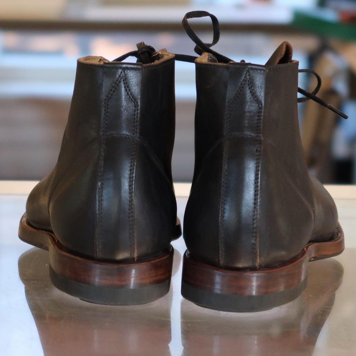 Photo by unsung on October 3, 2023 of the Unsung Prototype in Horween Black Wrangler Horsehide.